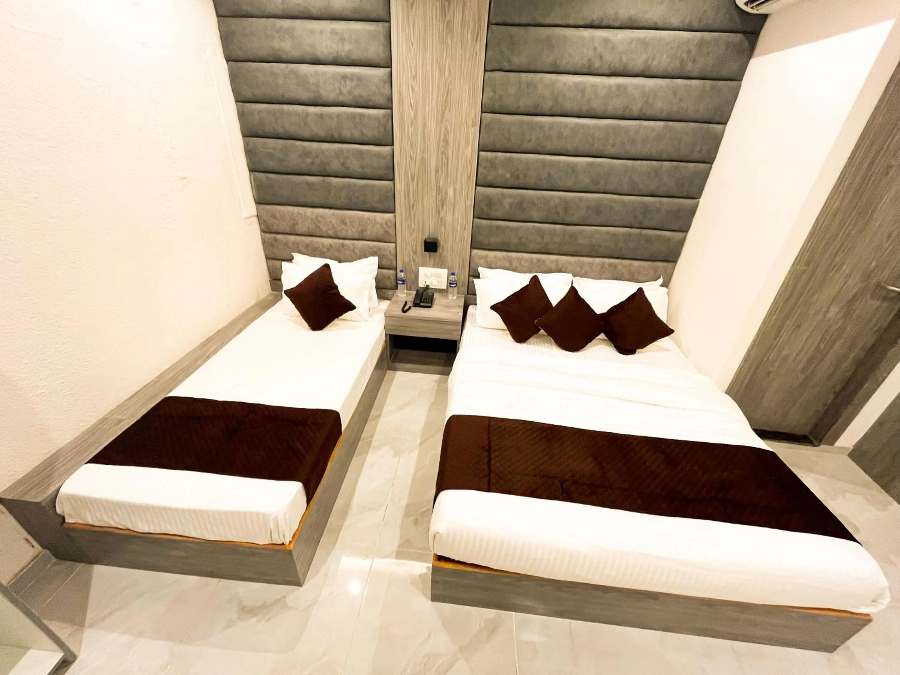 Bed in Hotel Grand Executive