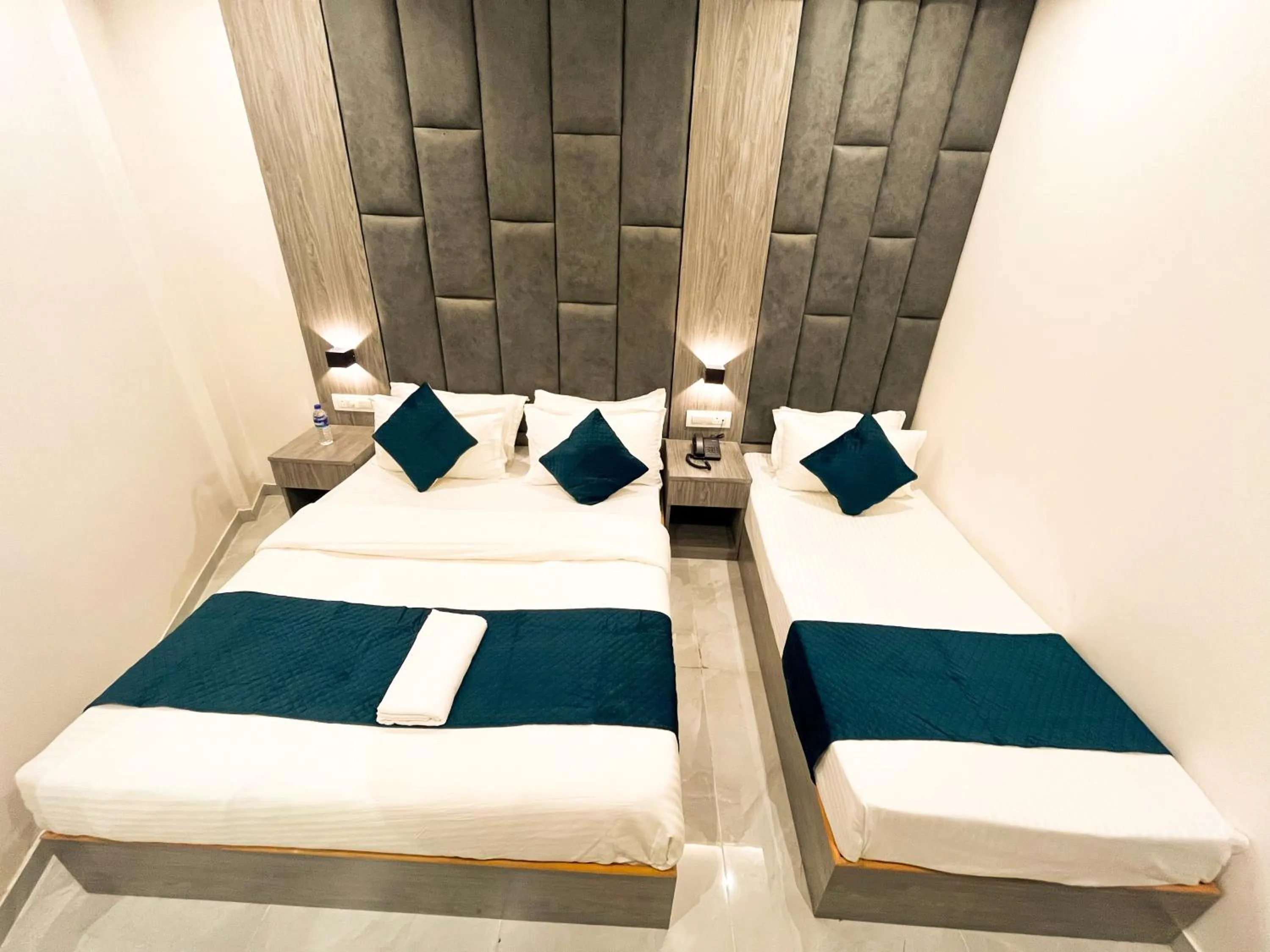 Bed in Hotel Grand Executive