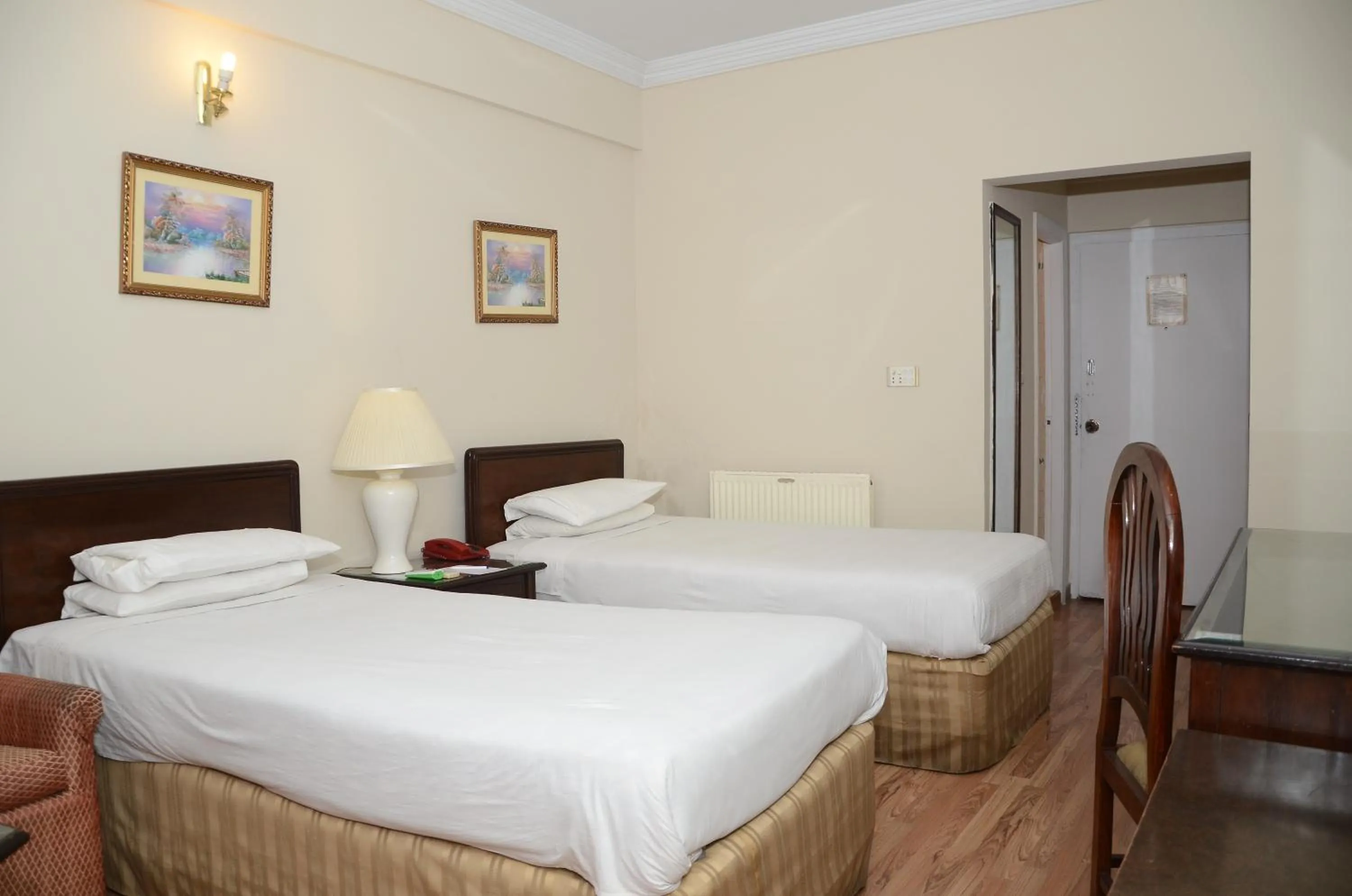 Photo of the whole room, Bed in Carlton Tower Hotel Lahore