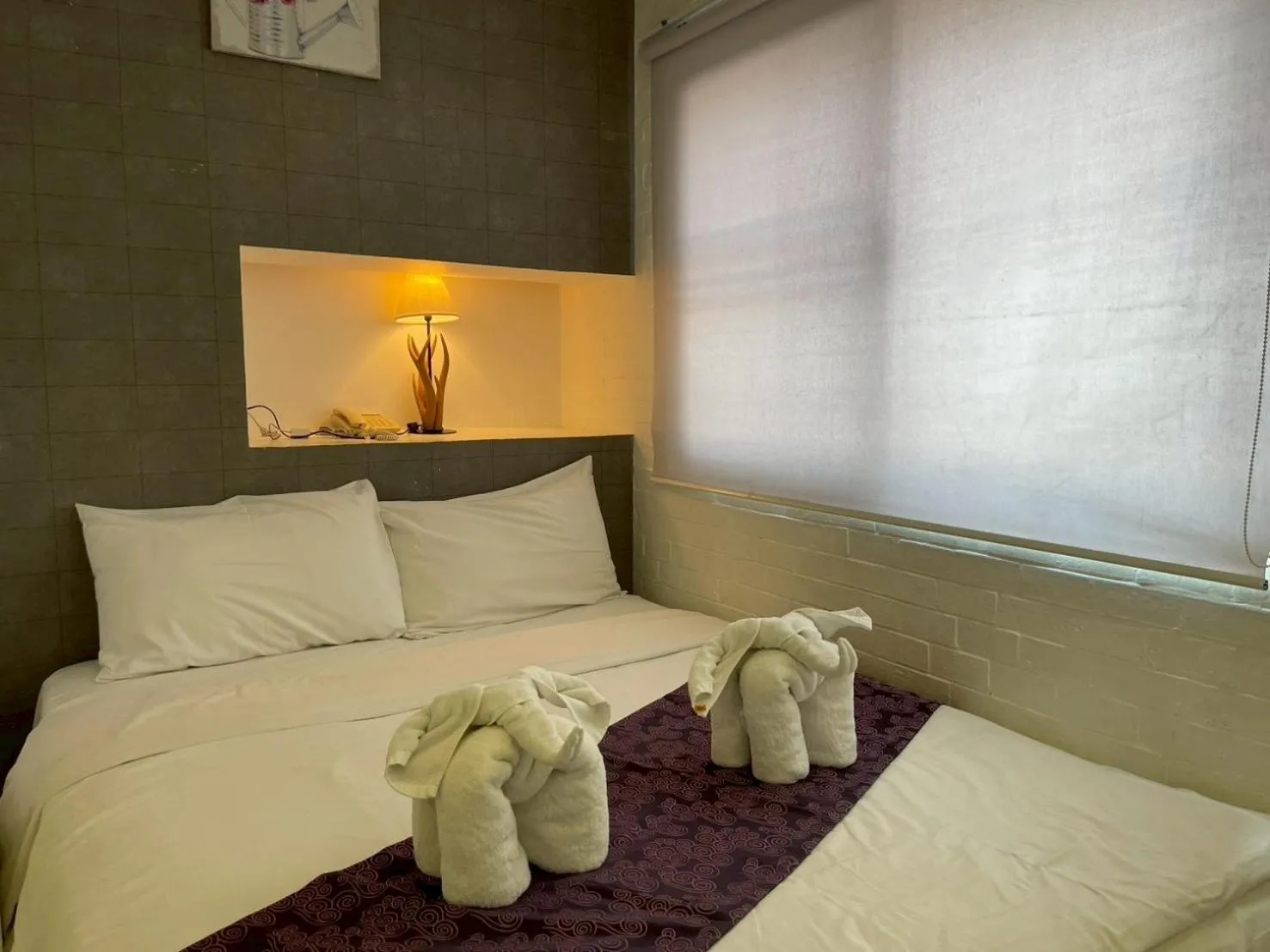 Bed in The Guest Arak Boutique Hotel