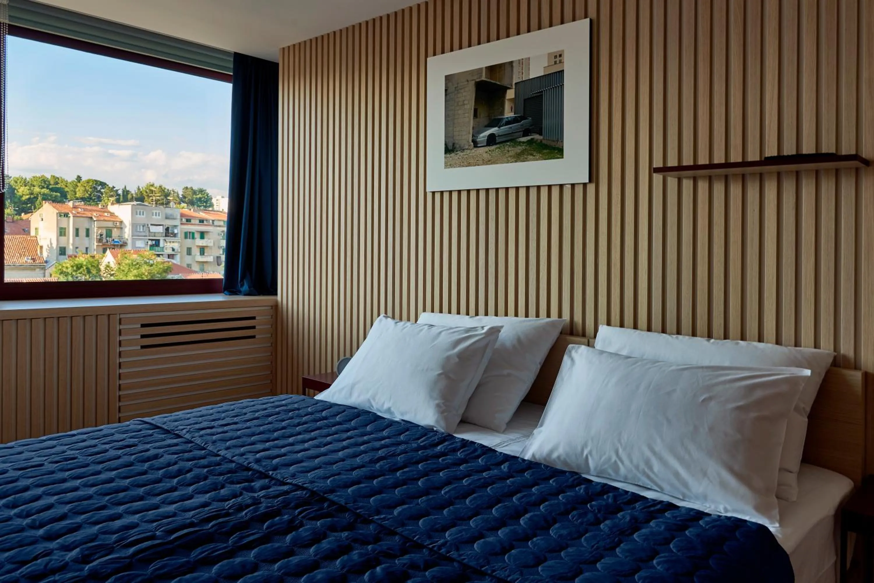 Bed in Horizon Luxury Suites & Design Rooms