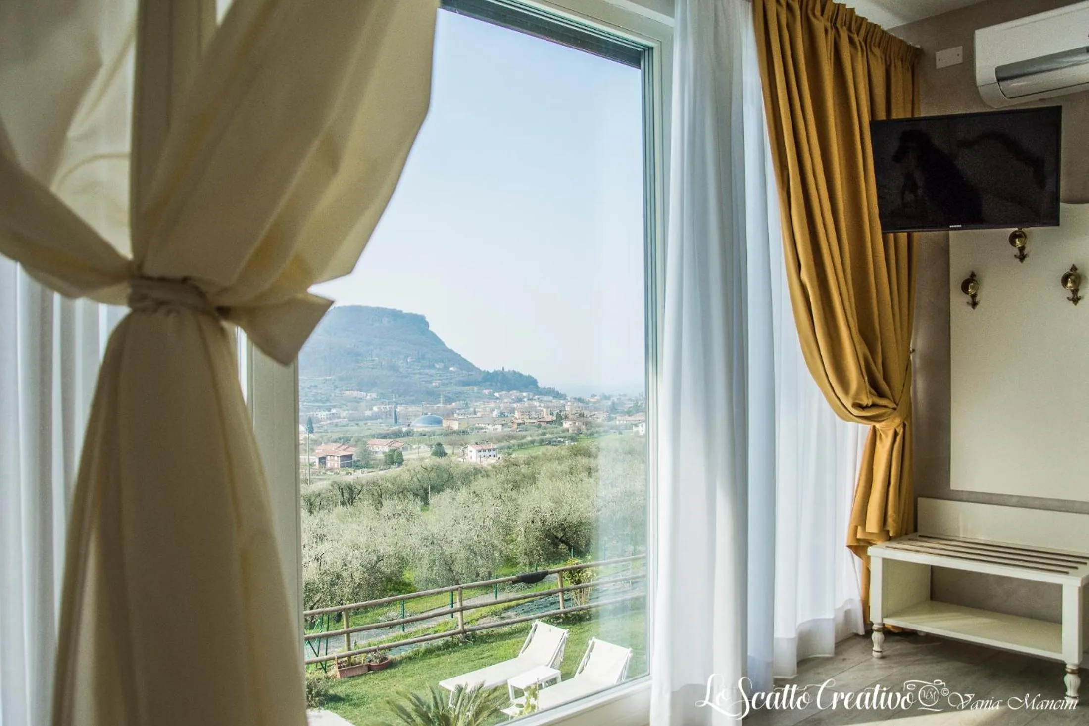 Bedroom in Relais Villa Olivi