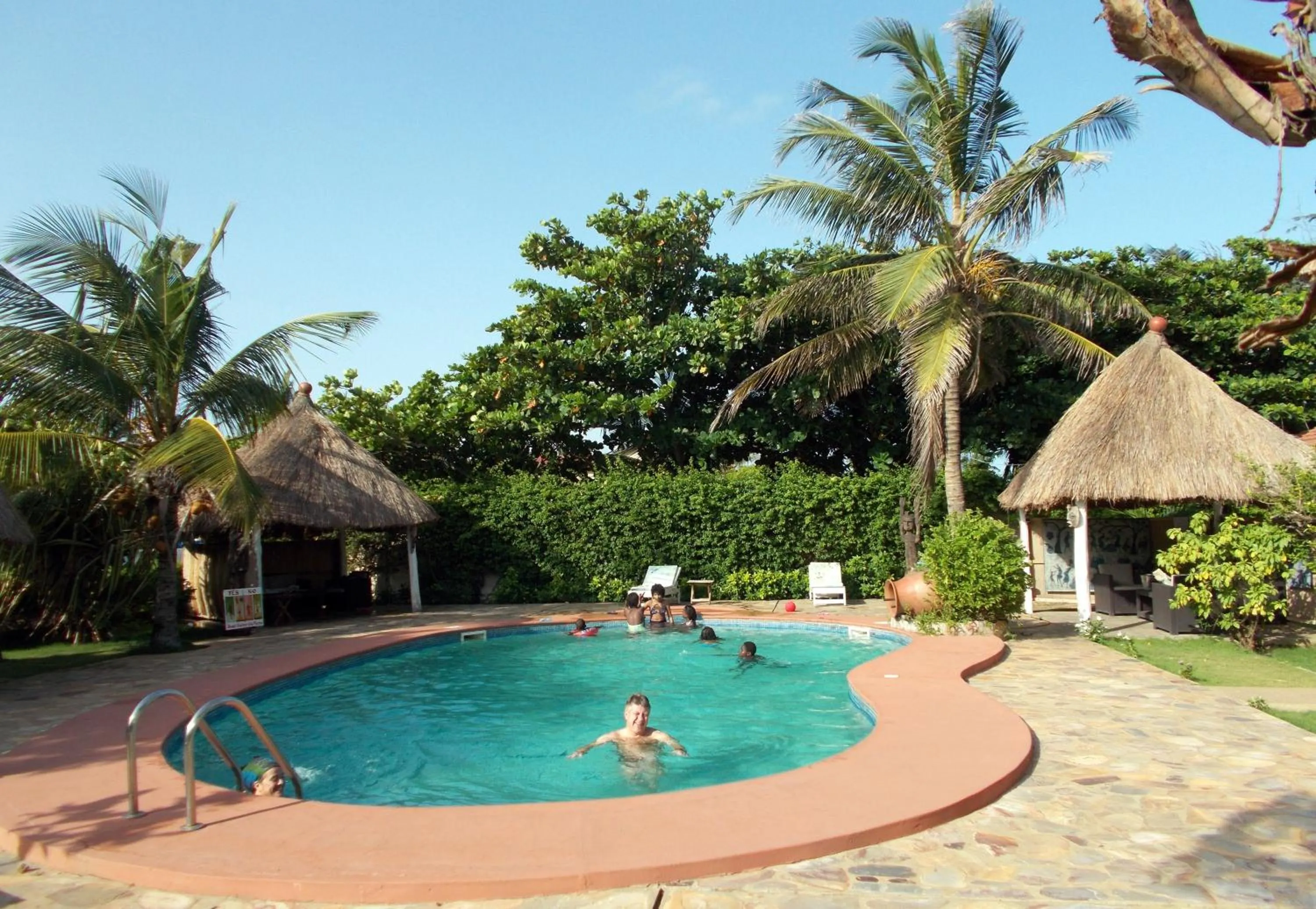 Communal lounge/ TV room in Hôtel Alizé Plage