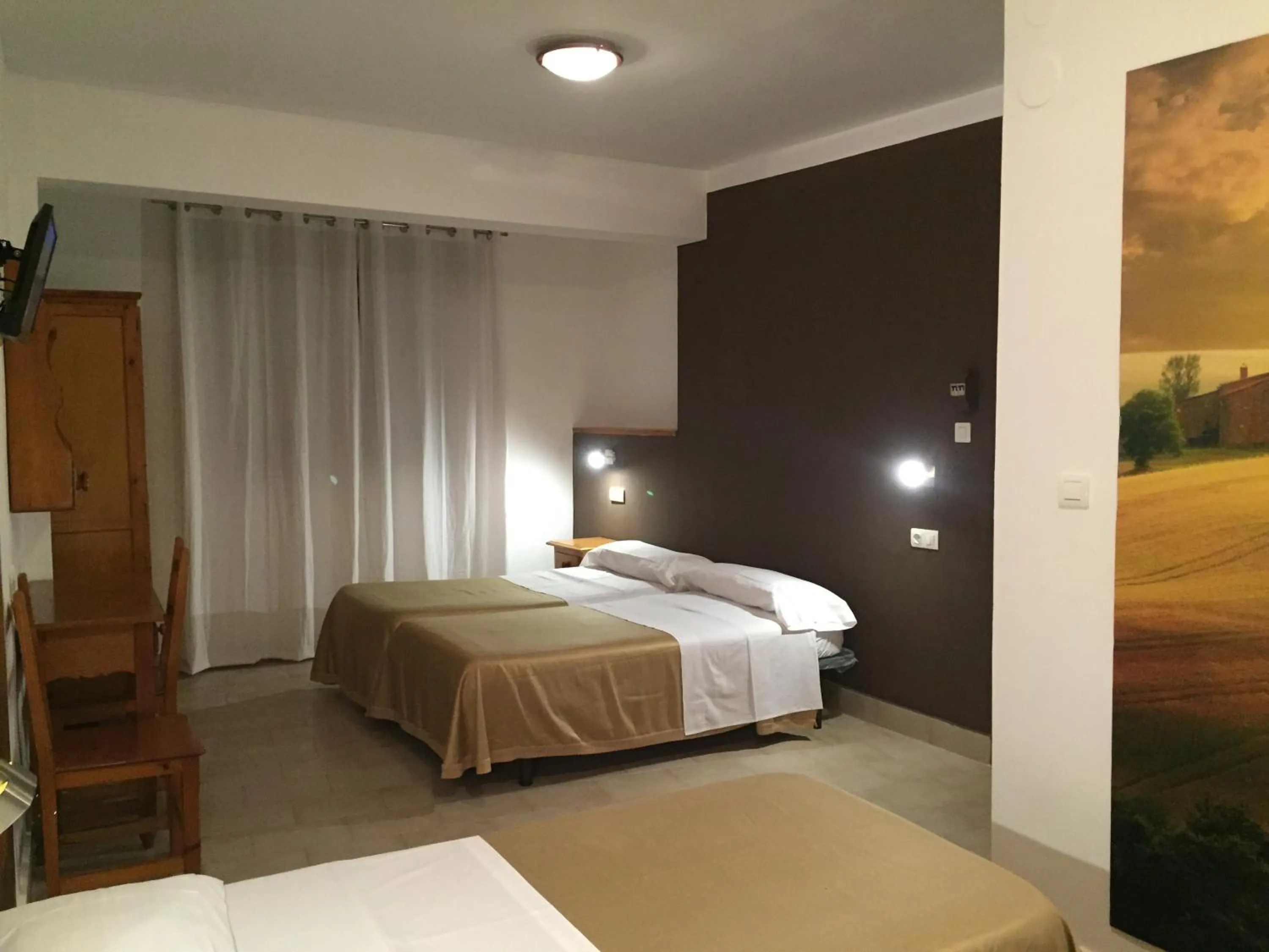 Photo of the whole room, Bed in Hostal Puerto Beach