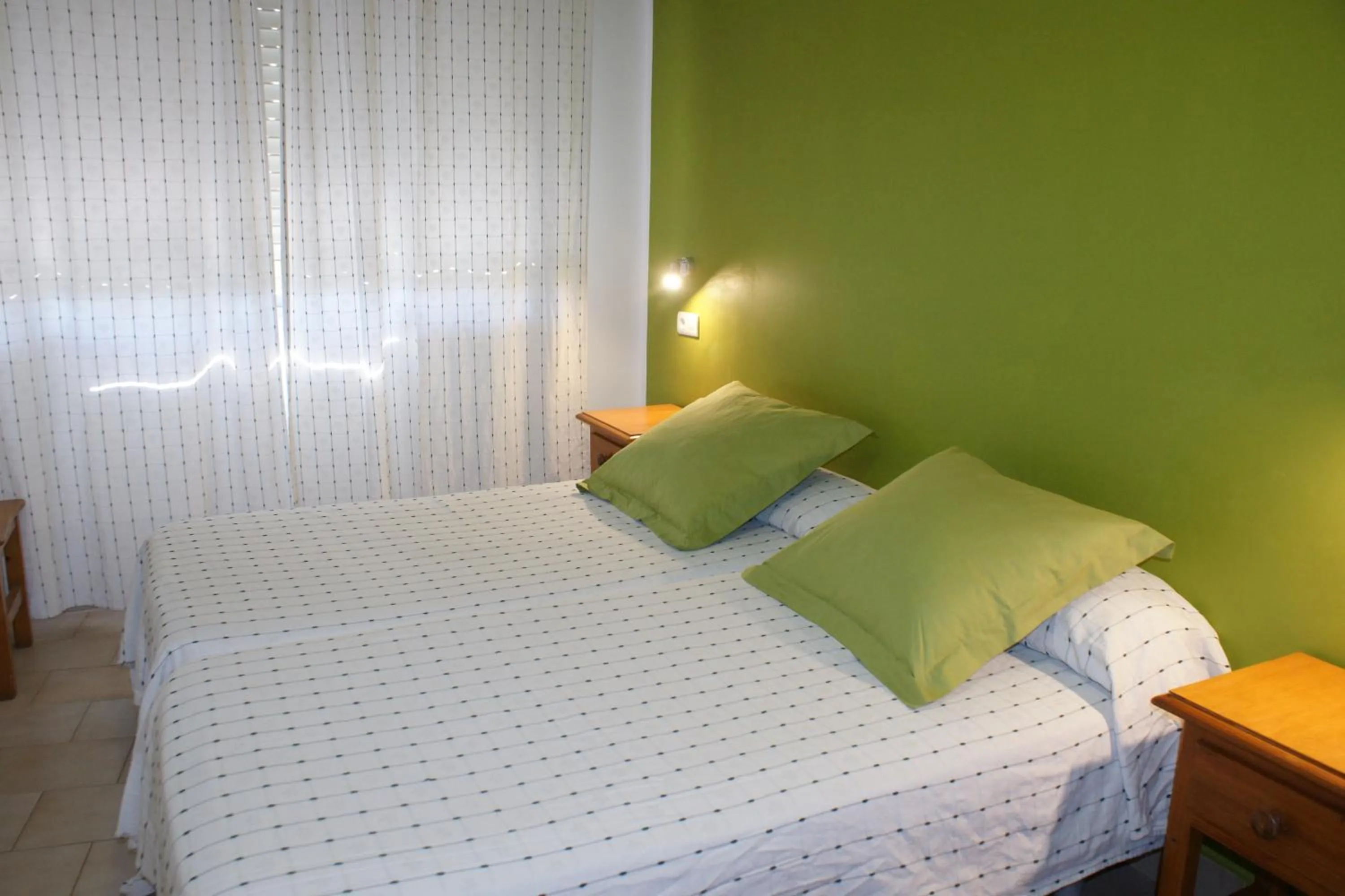 Bed in Hostal Puerto Beach