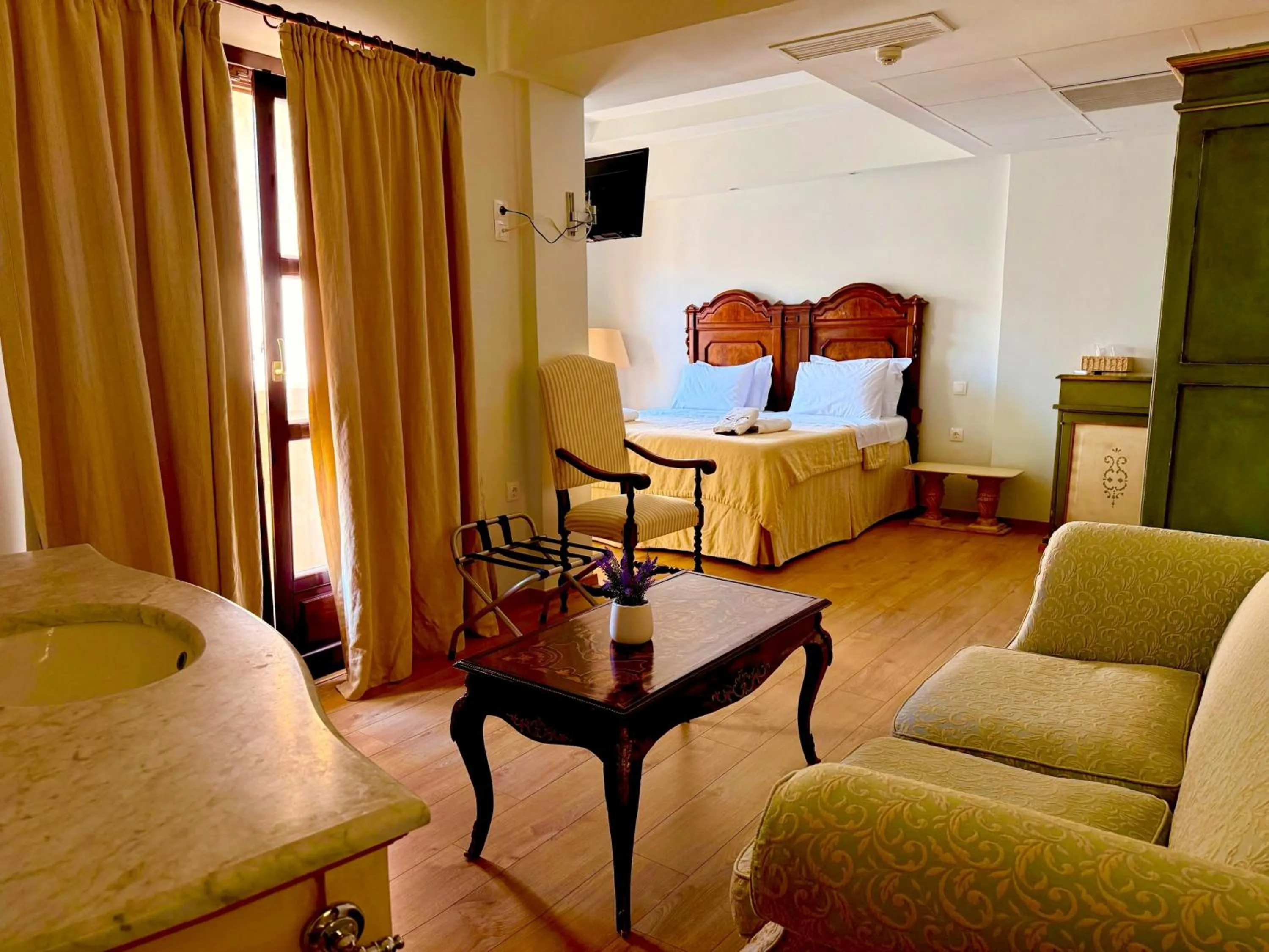 Bed in Great Greece Le Convivial Suites