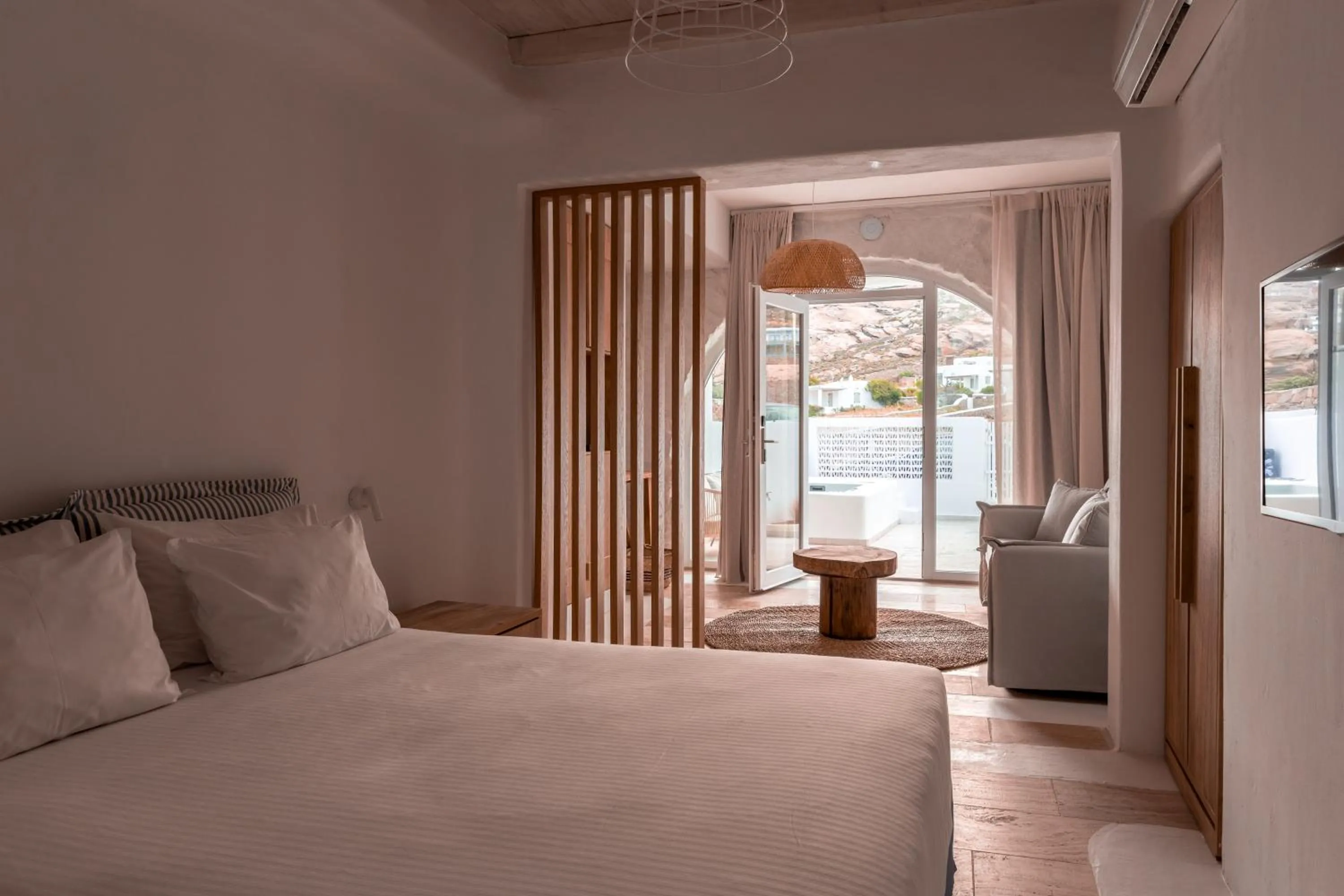 Bed in Senses Luxury Suites & Villas
