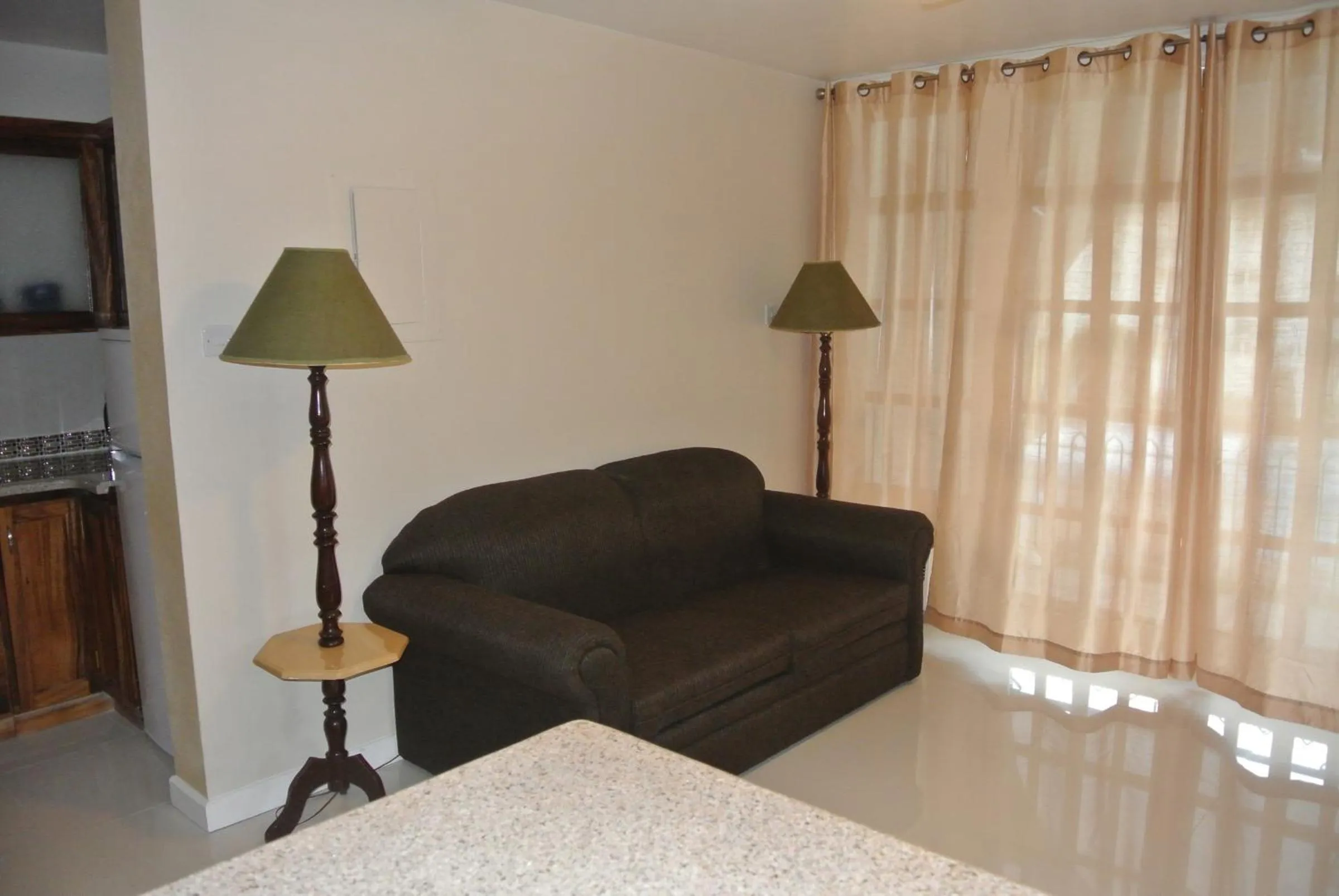 Living room, Bed in Beach One Bedroom Suite 13