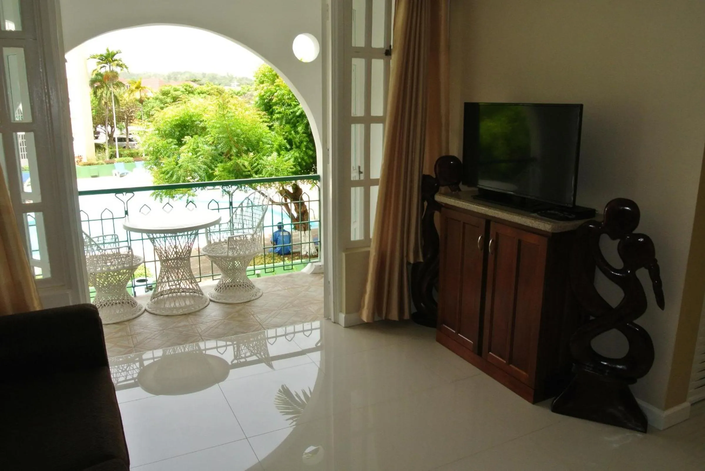 Swimming pool in Beach One Bedroom Suite 13