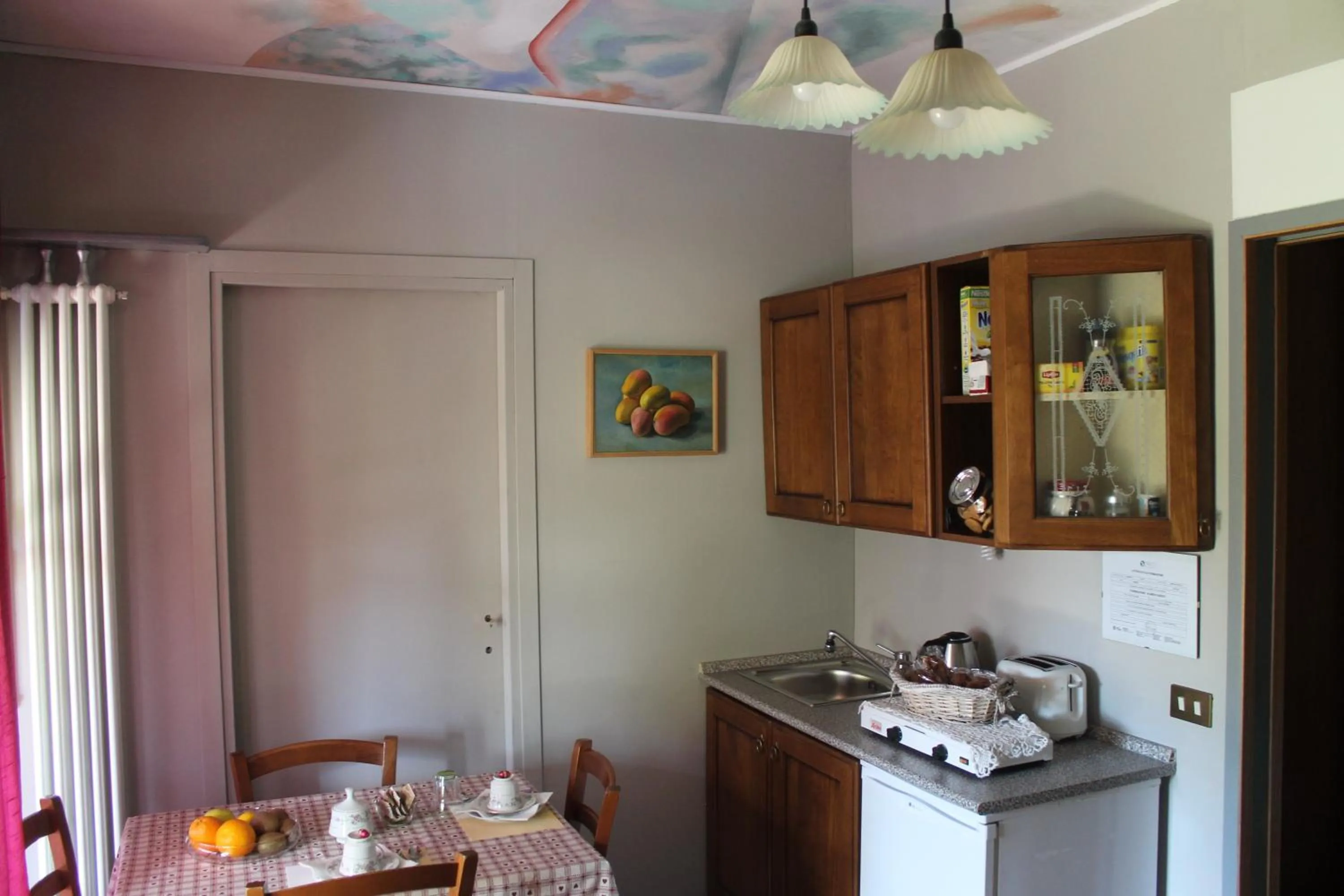 Kitchen or kitchenette in B&B Artistic House