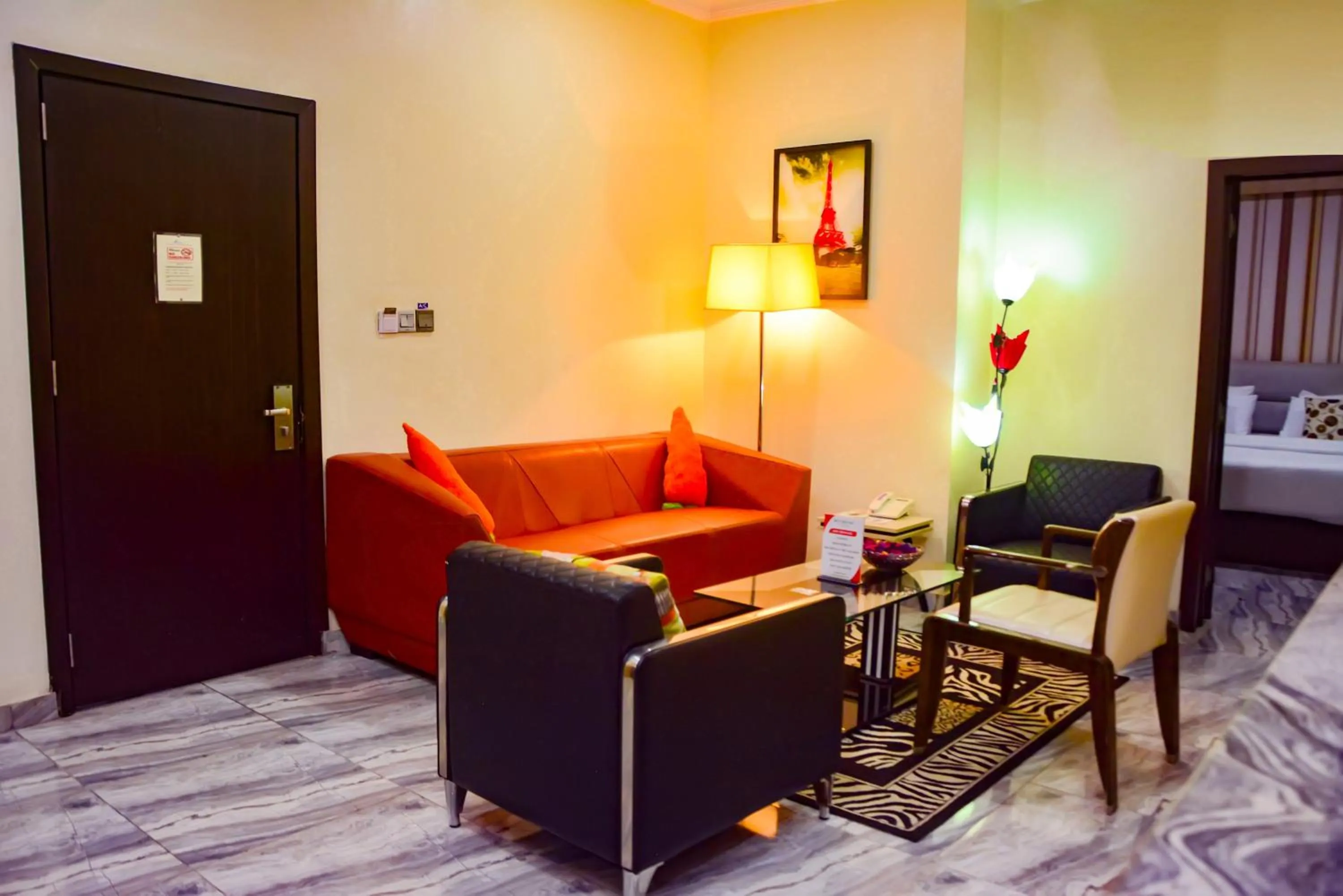 Bed in GolfView Suites & Conference Center