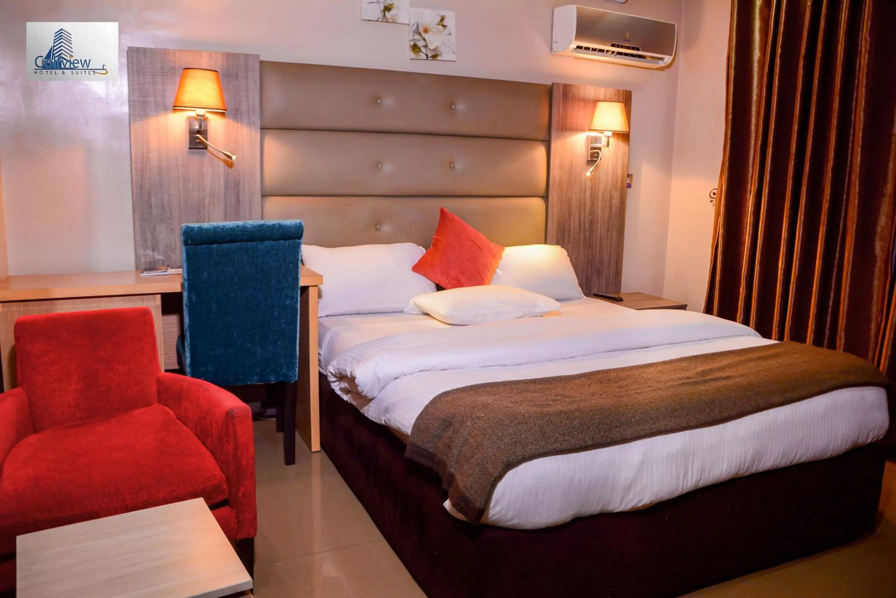 Bedroom, Bed in GolfView Suites & Conference Center