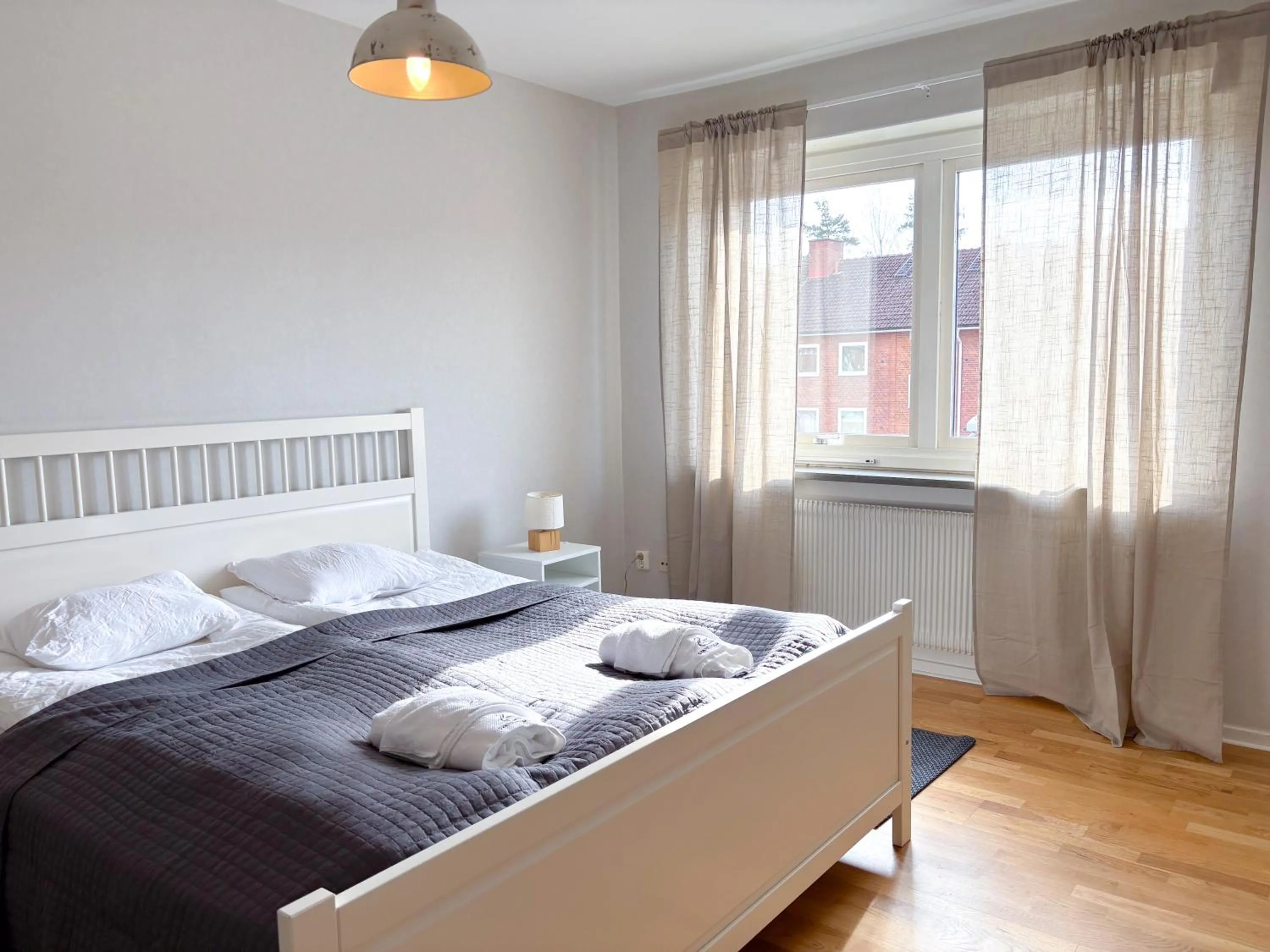 Bed in Säffle Suites by Svaneholm Hotel