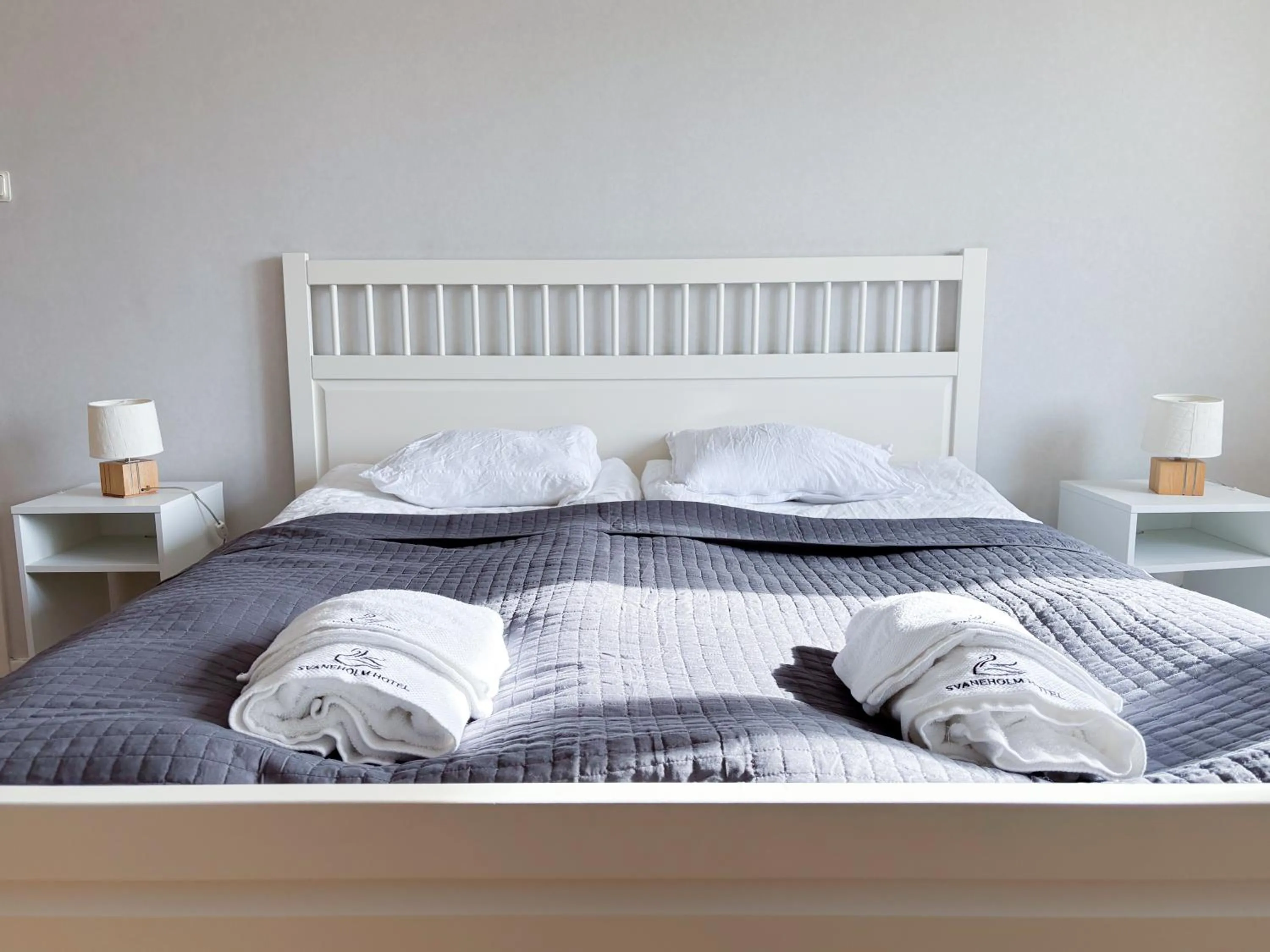 Bed in Säffle Suites by Svaneholm Hotel