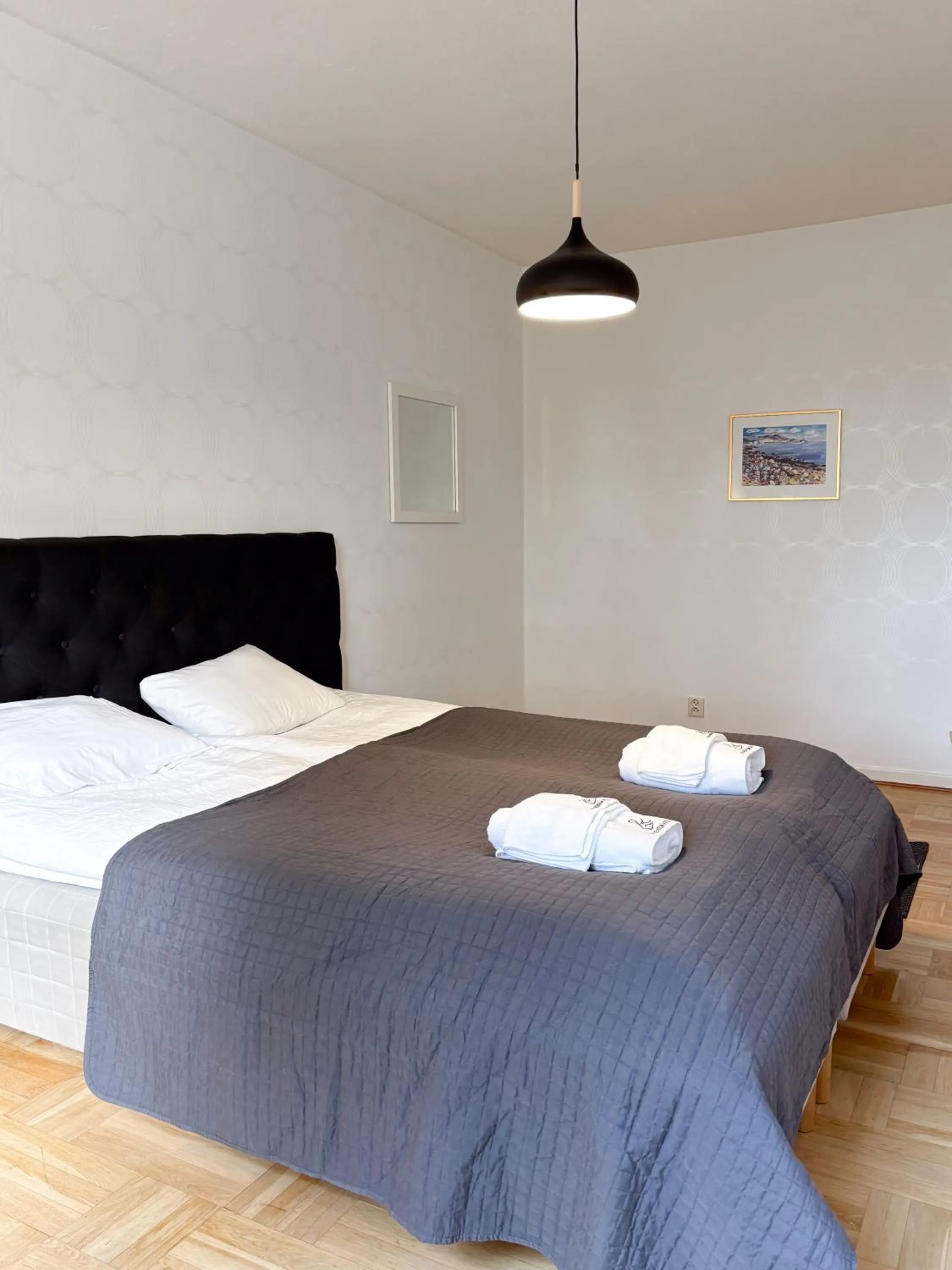 Bed in Säffle Suites by Svaneholm Hotel