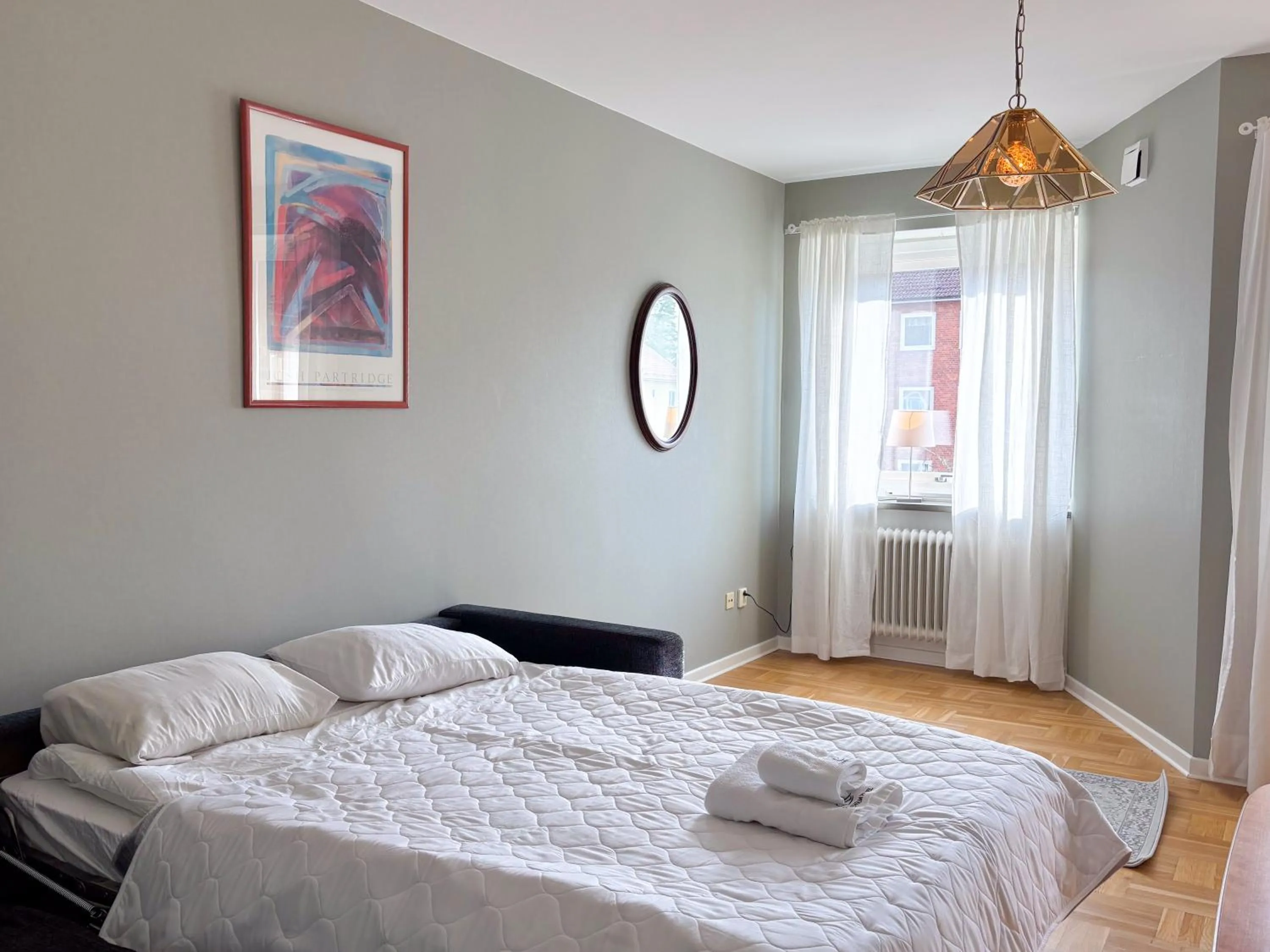 Bed in Säffle Suites by Svaneholm Hotel