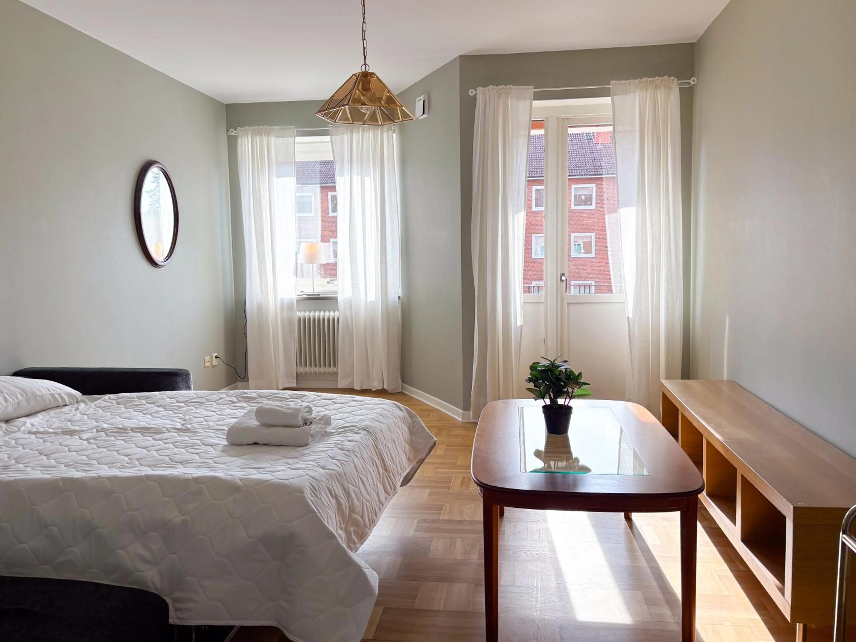 Bed in Säffle Suites by Svaneholm Hotel