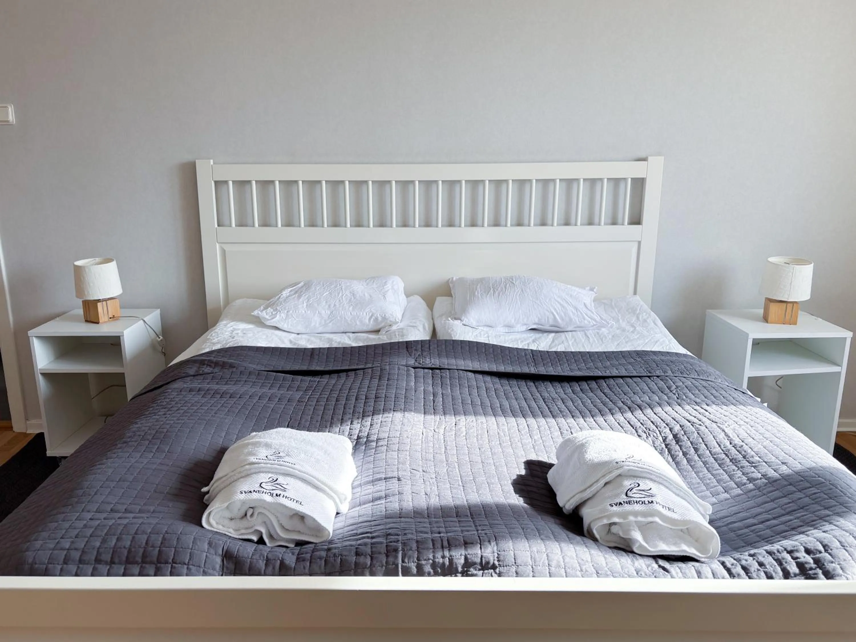 Bed in Säffle Suites by Svaneholm Hotel