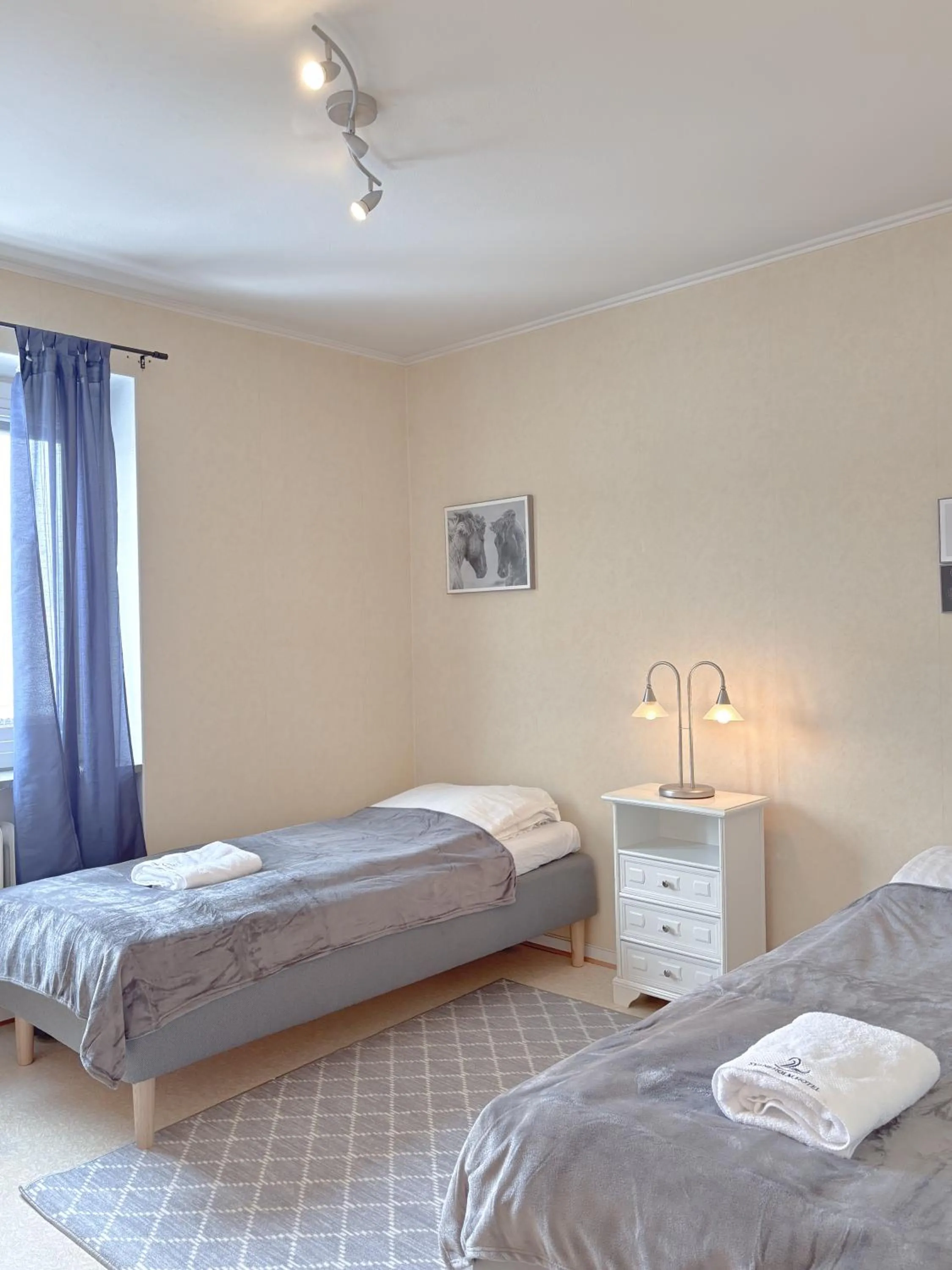 Bed in Säffle Suites by Svaneholm Hotel