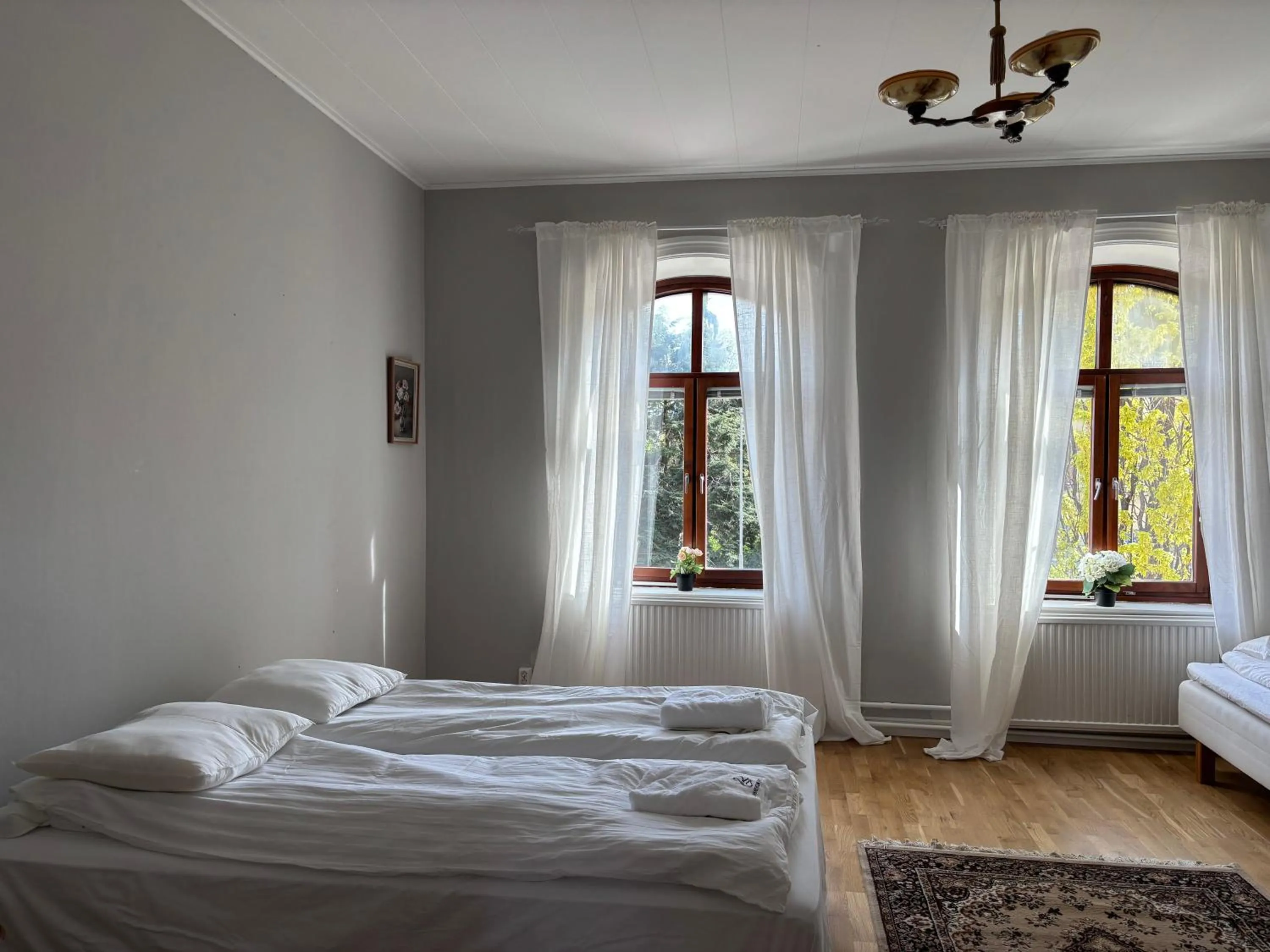 Bed in Säffle Suites by Svaneholm Hotel