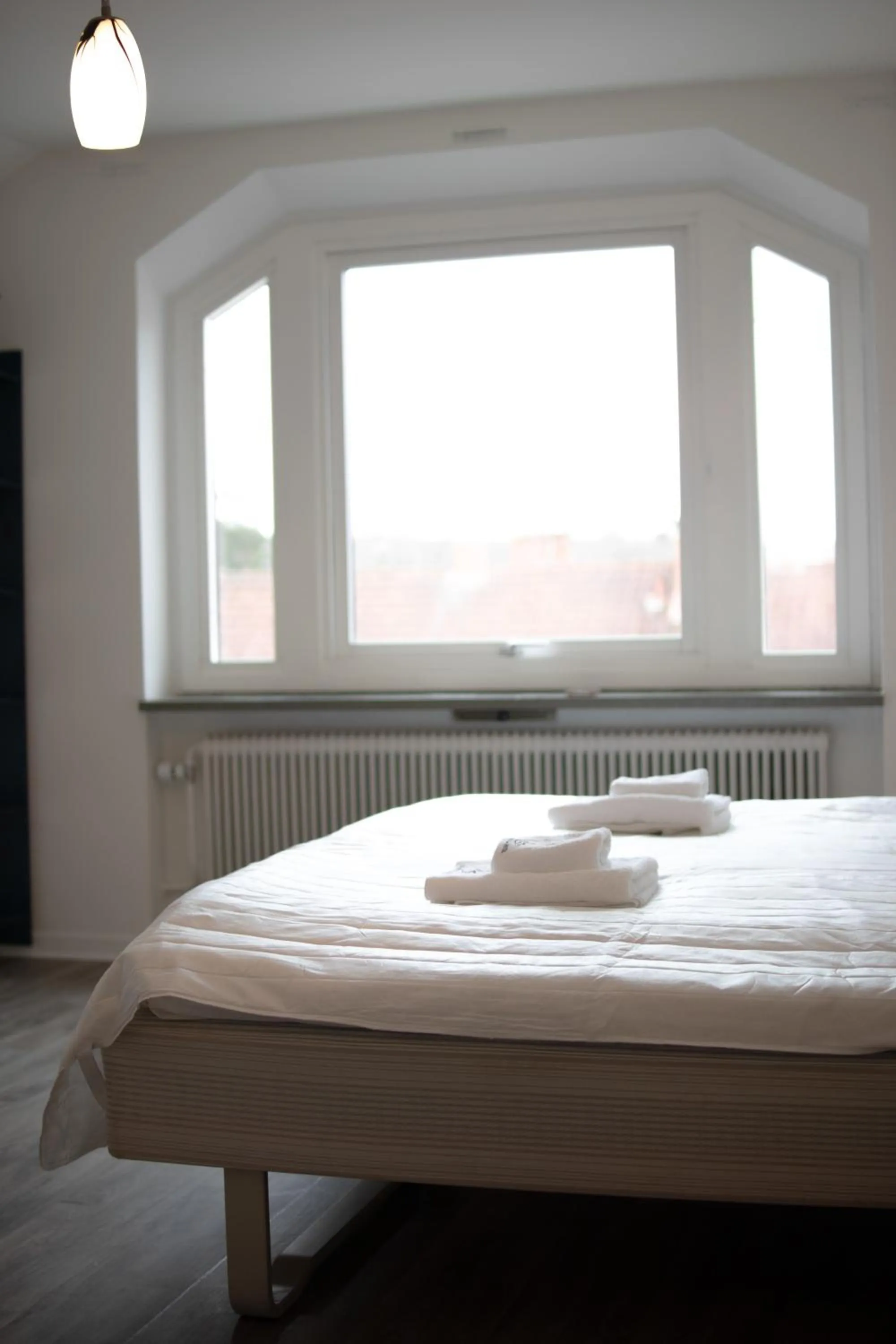 Bed in Säffle Suites by Svaneholm Hotel