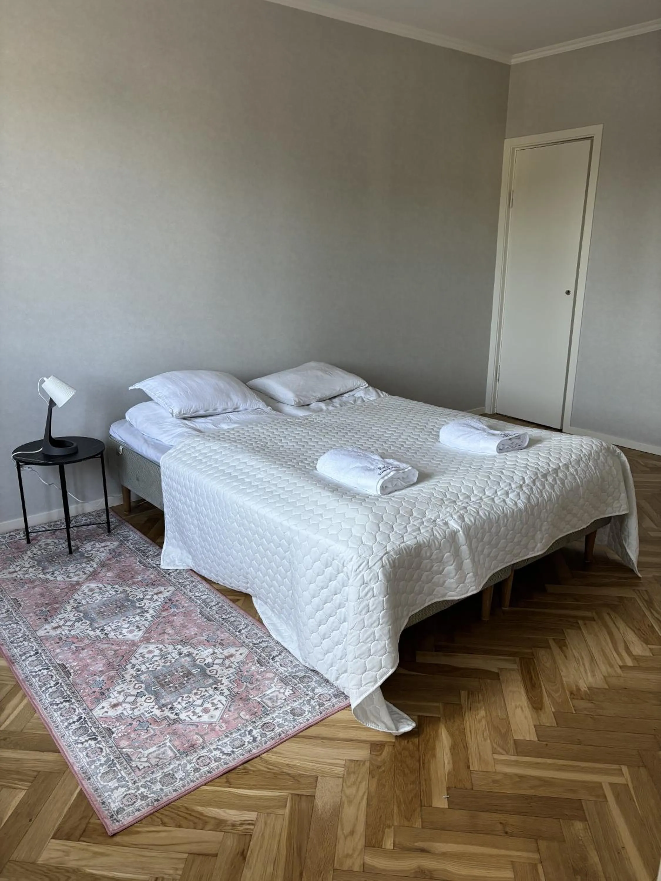 Bed in Säffle Suites by Svaneholm Hotel