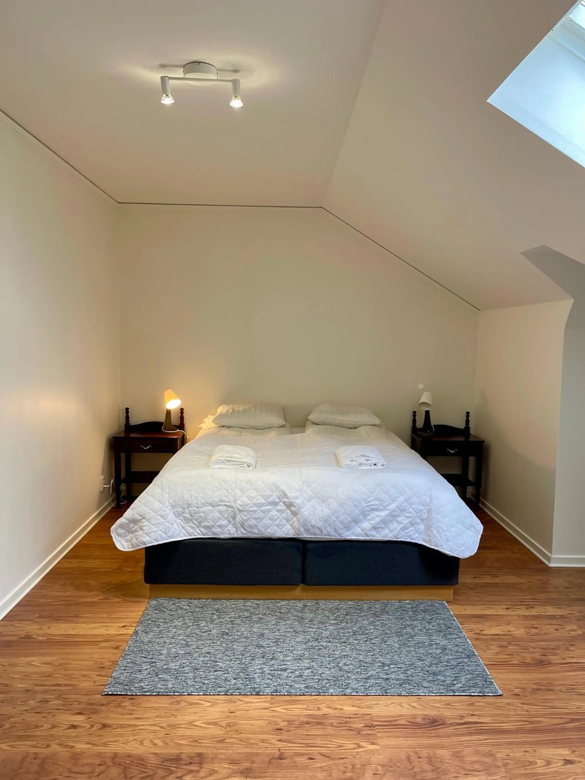 Bed in Säffle Suites by Svaneholm Hotel