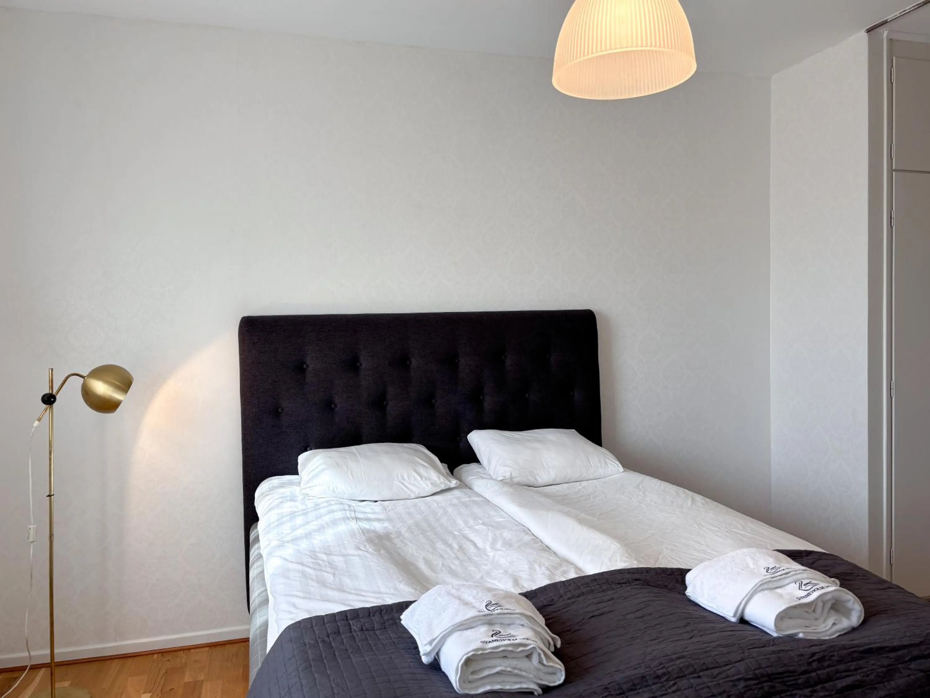 Bed in Säffle Suites by Svaneholm Hotel