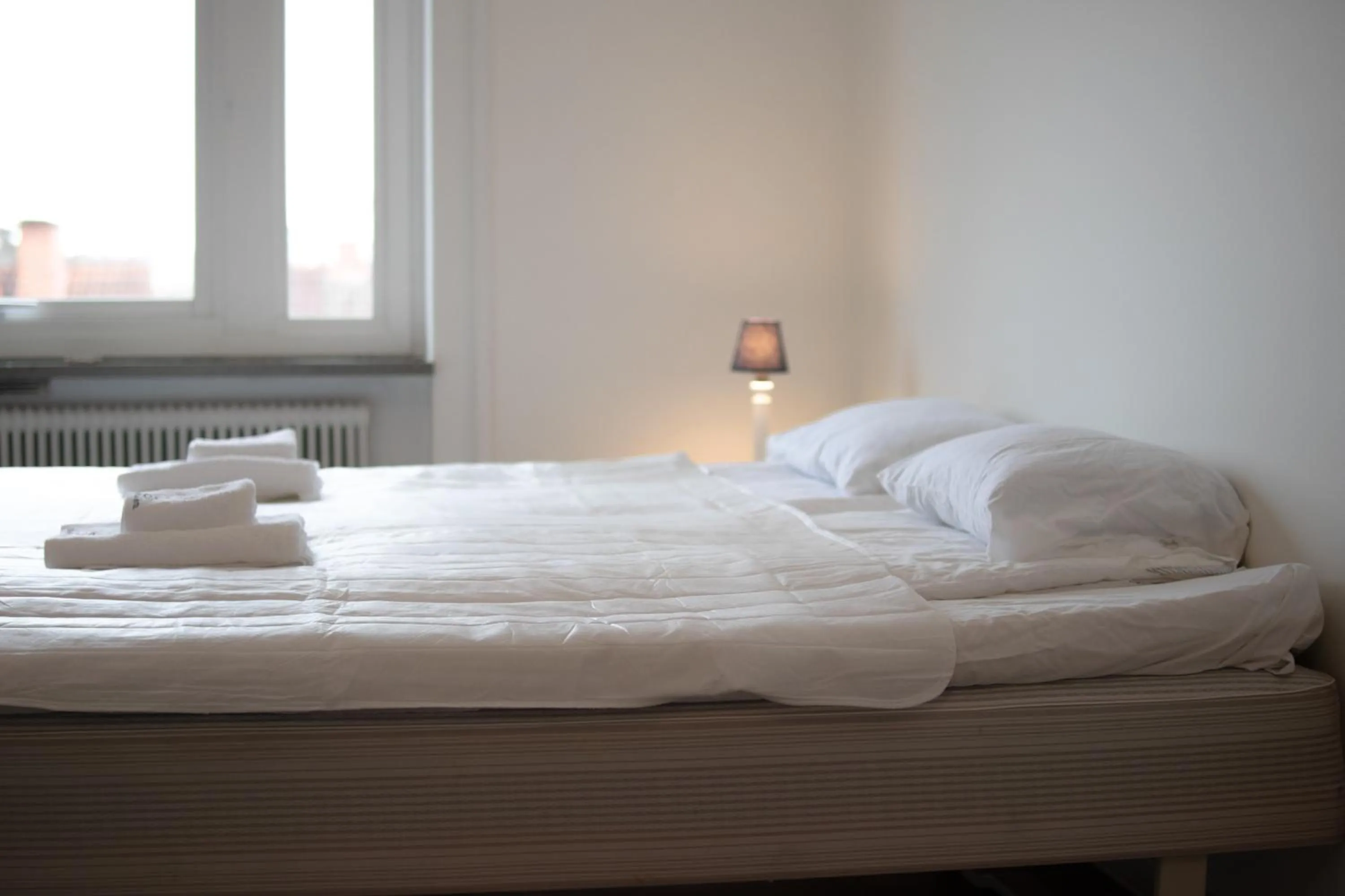 Bed in Säffle Suites by Svaneholm Hotel