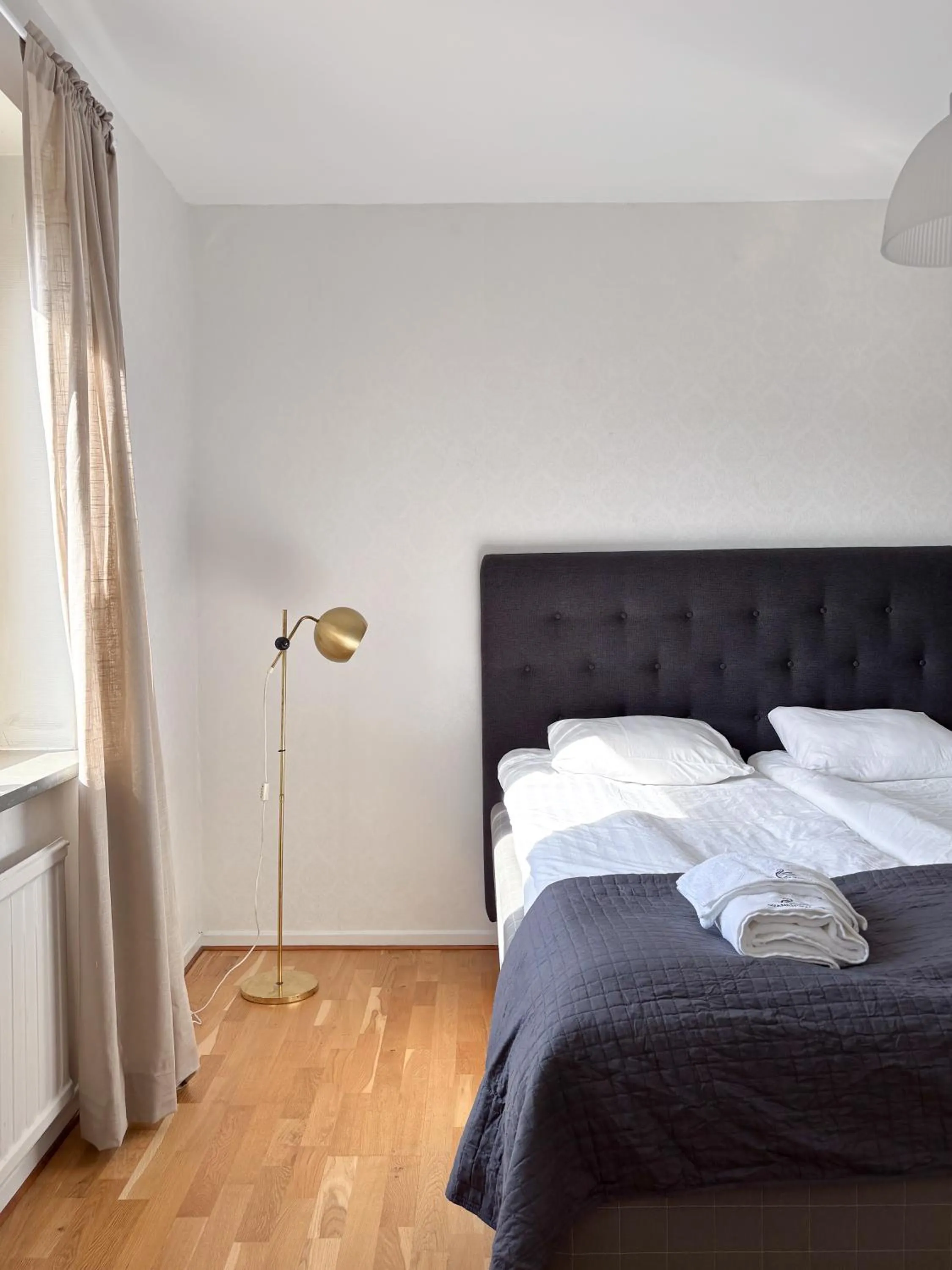 Bed in Säffle Suites by Svaneholm Hotel