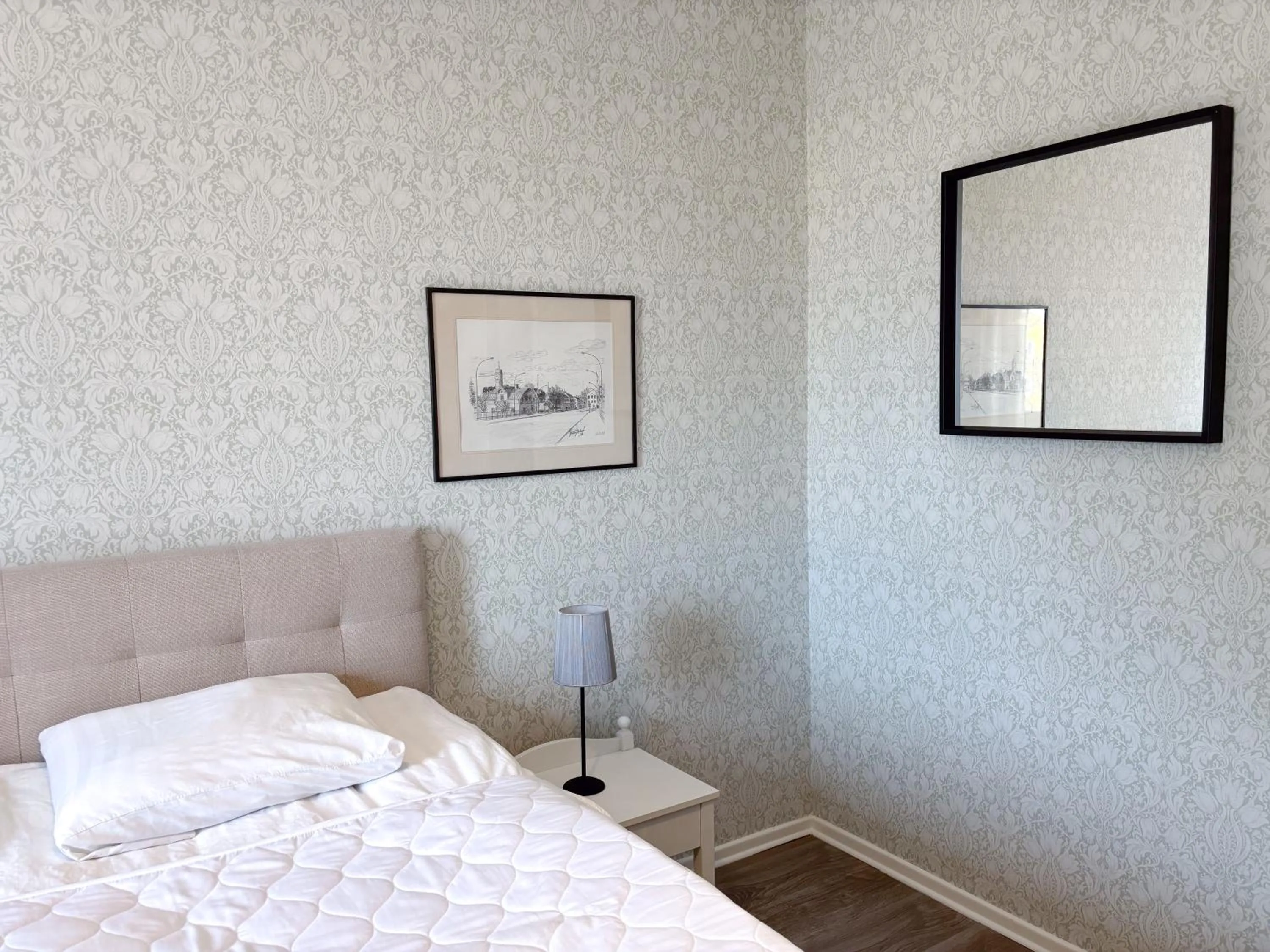 Bed in Säffle Suites by Svaneholm Hotel