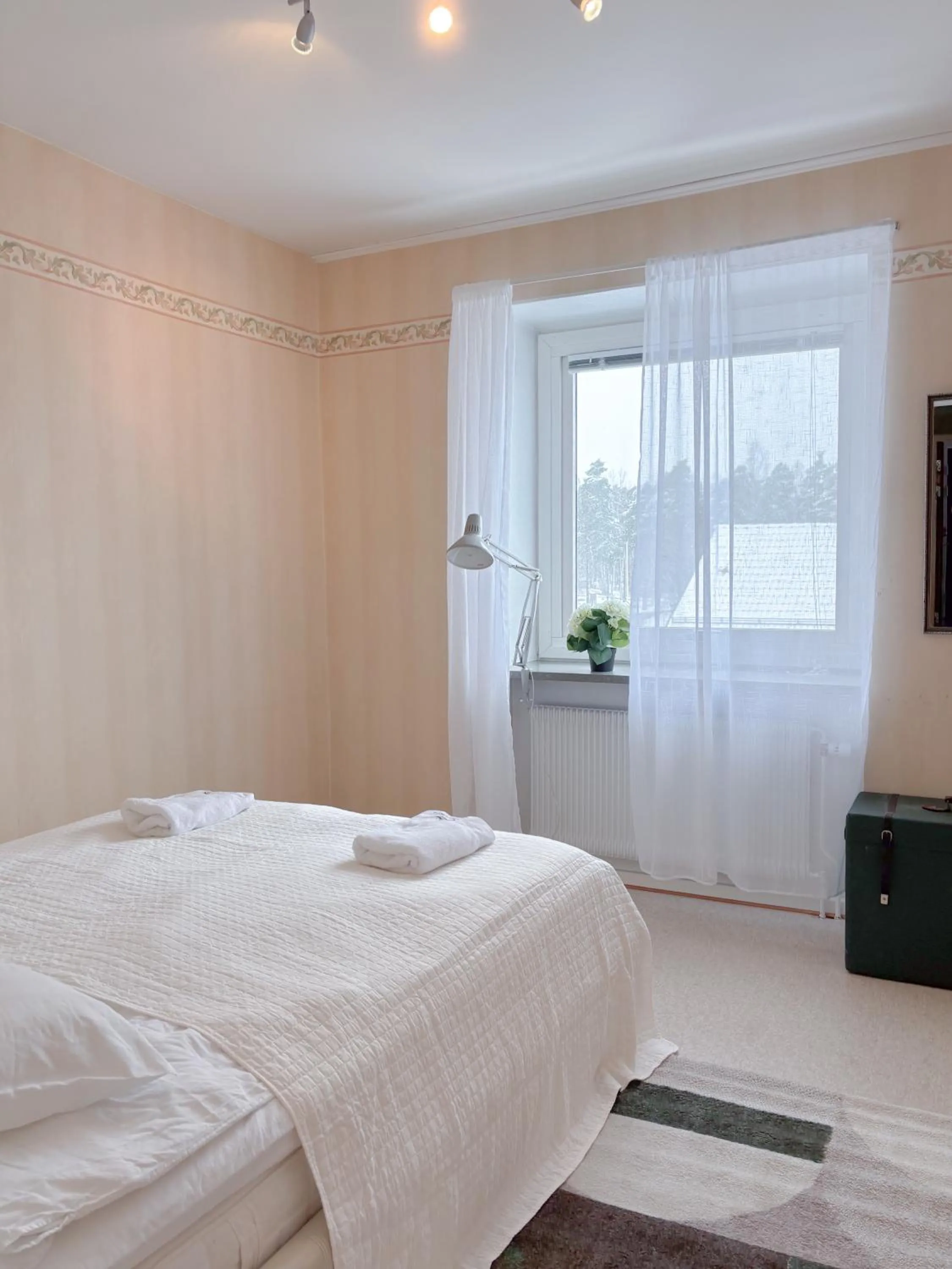 Bed in Säffle Suites by Svaneholm Hotel