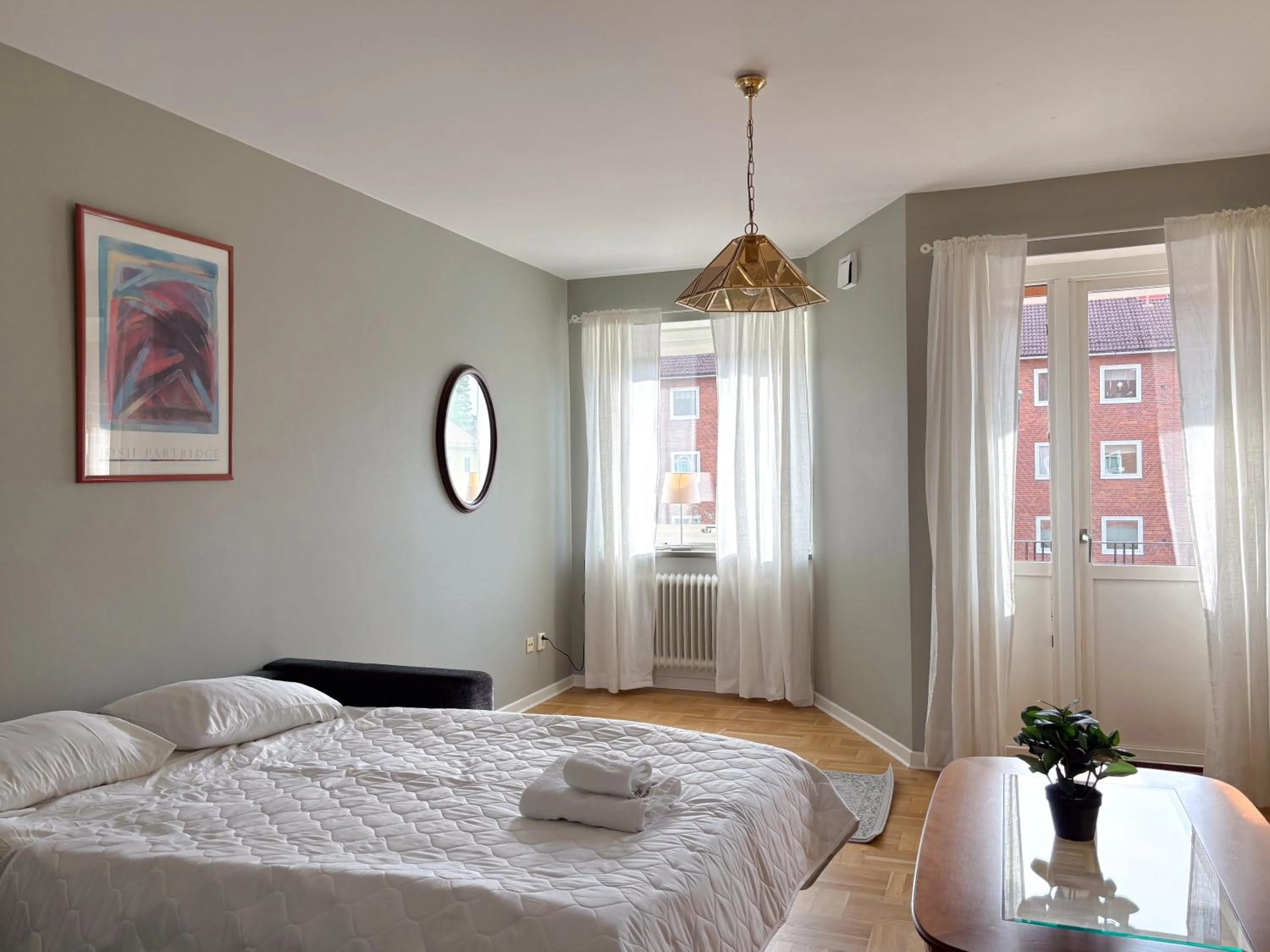 Bed in Säffle Suites by Svaneholm Hotel