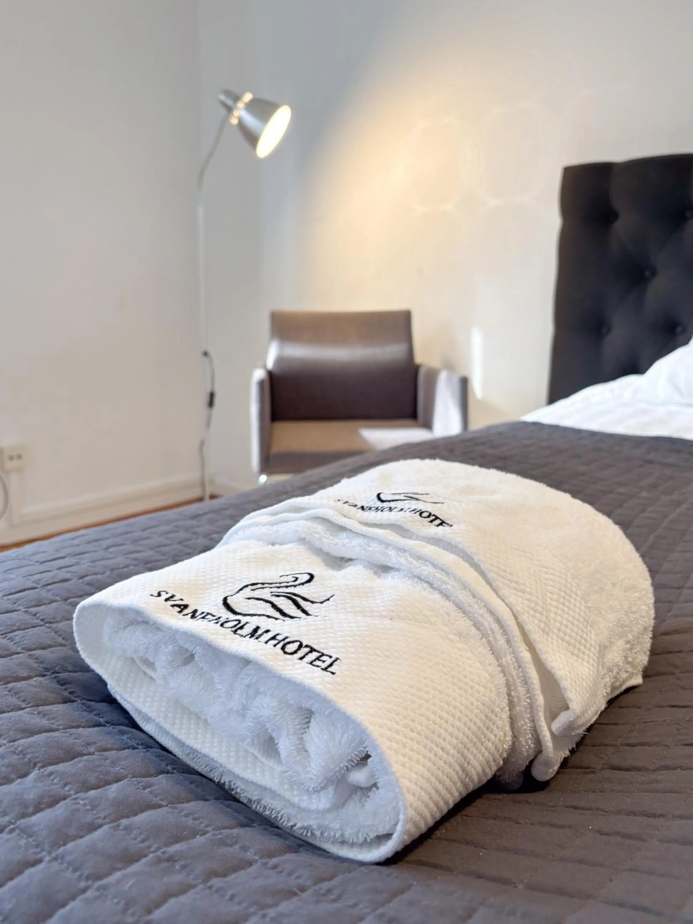 Bed in Säffle Suites by Svaneholm Hotel