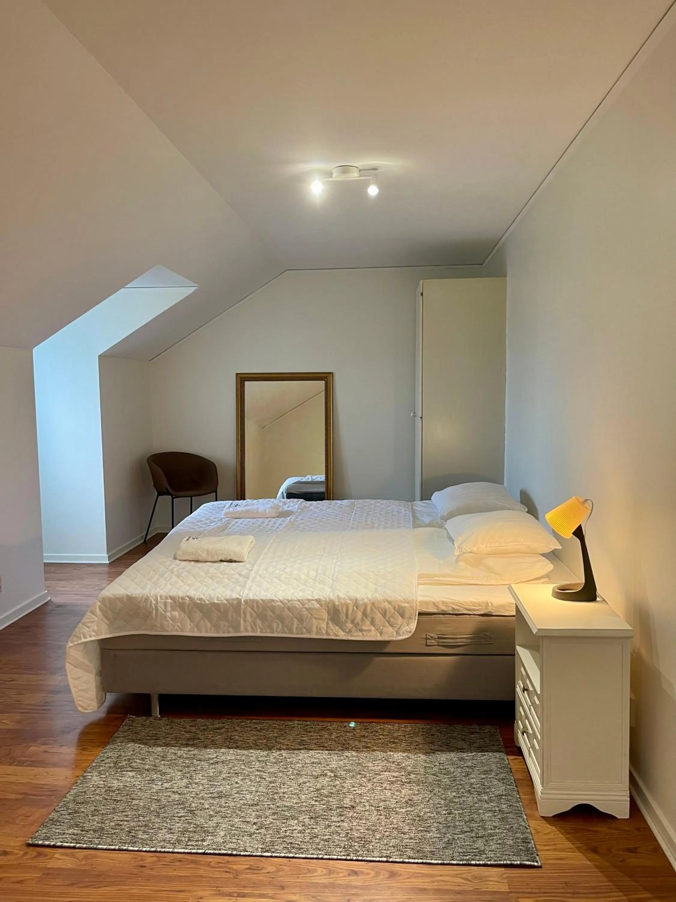 Bed in Säffle Suites by Svaneholm Hotel