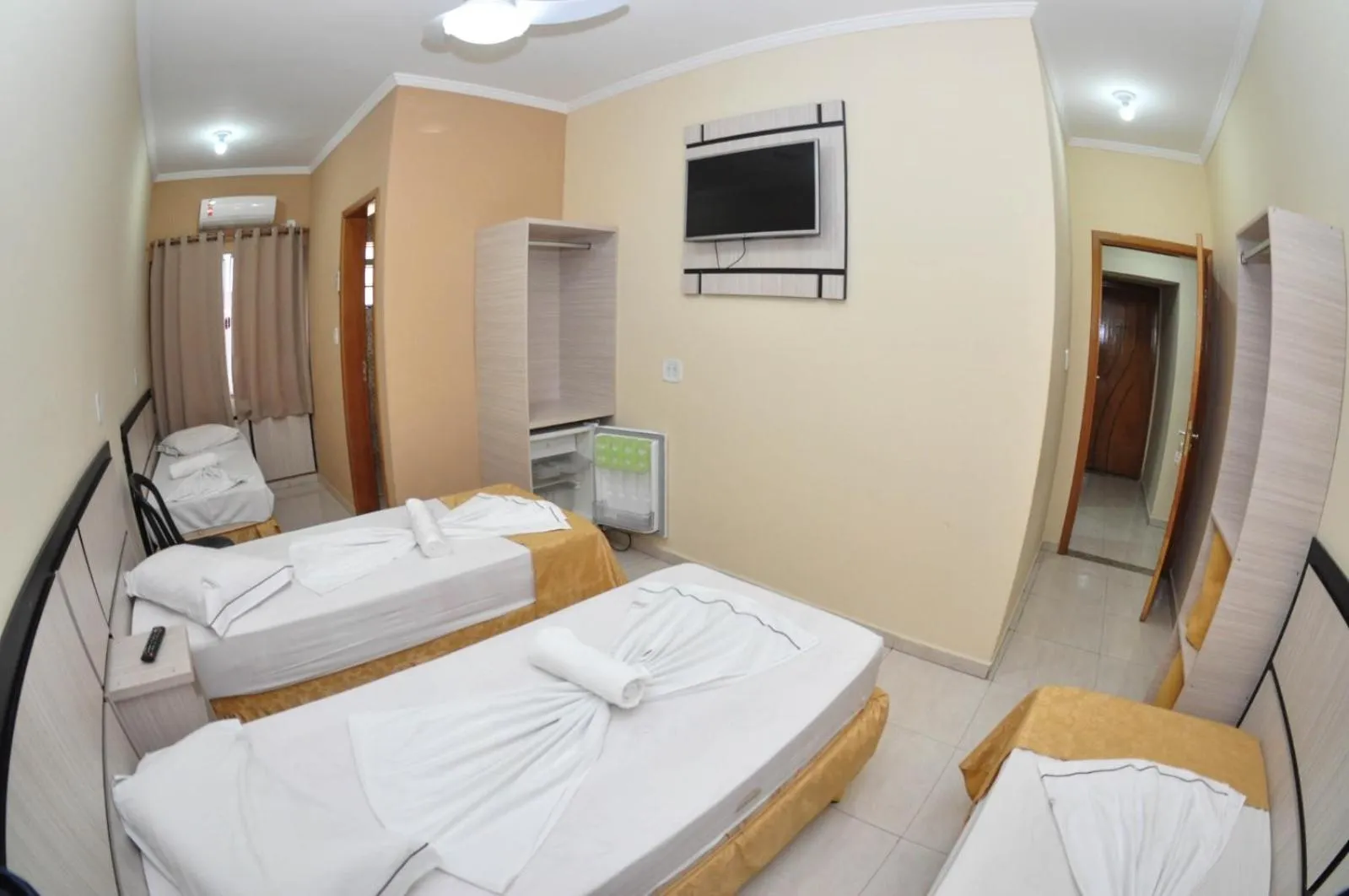 Bed in Eldorado Palace Hotel