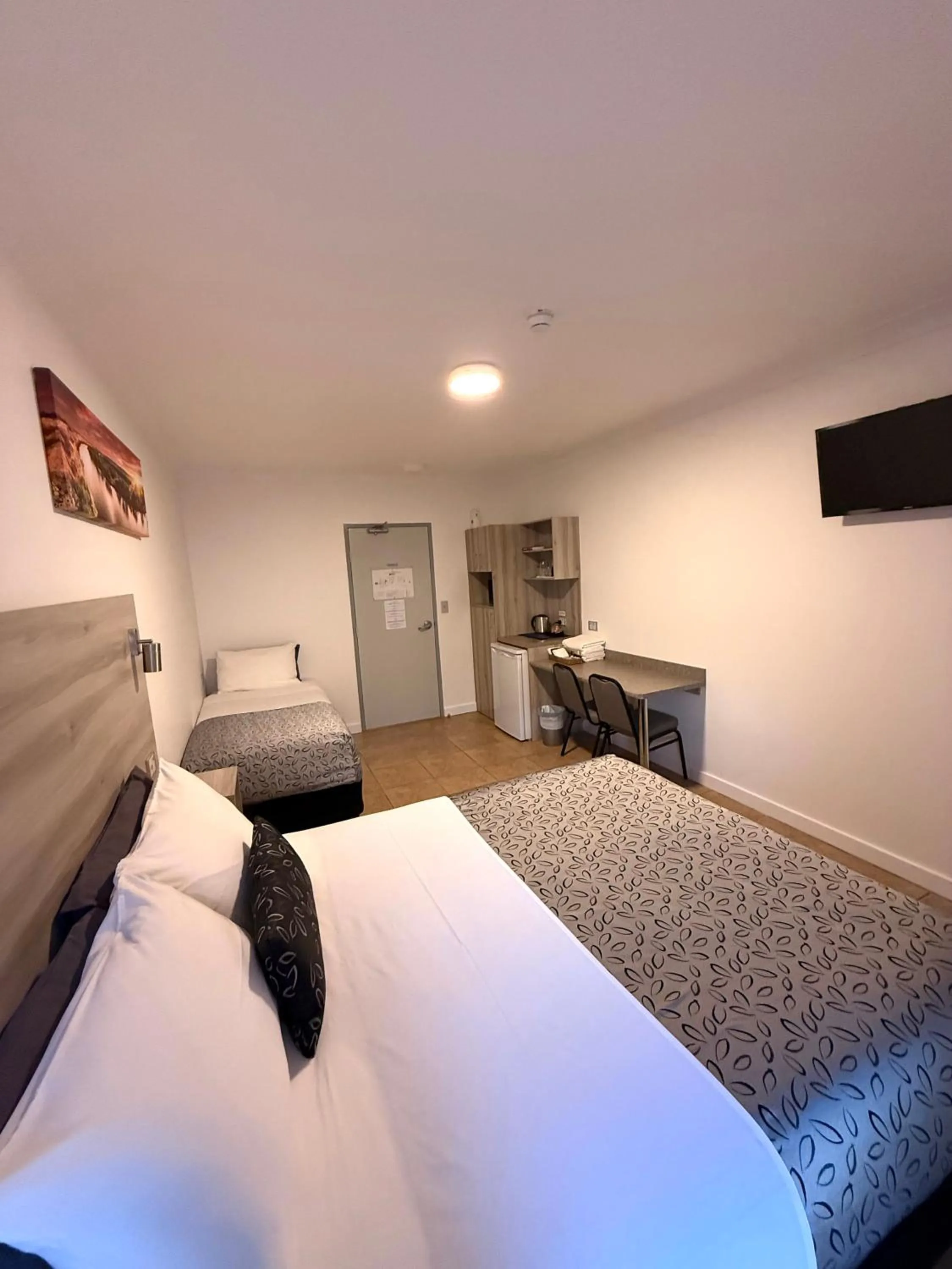 Bed in Childers Oasis Motel