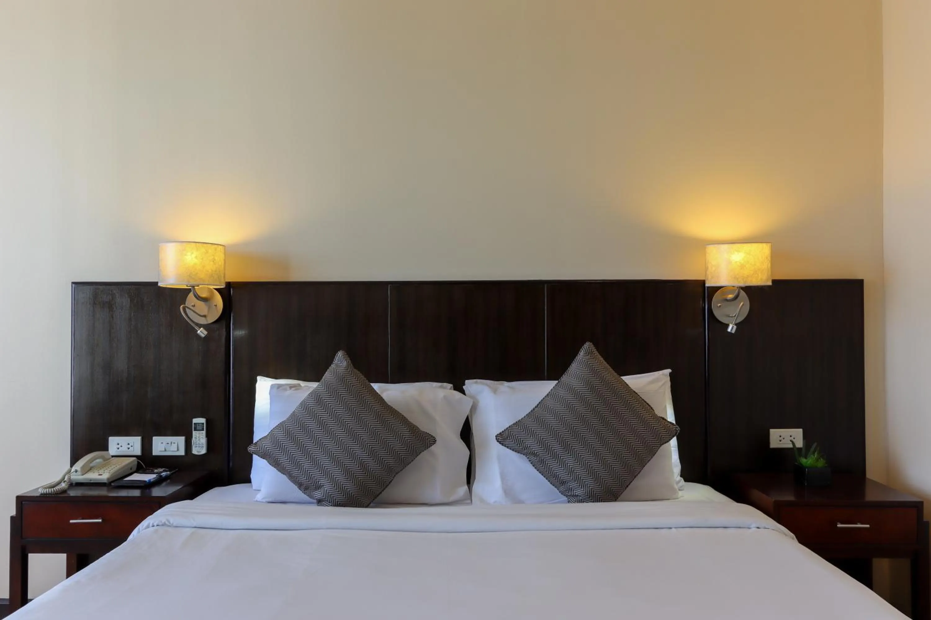 Bed in Paseo Premiere Hotel