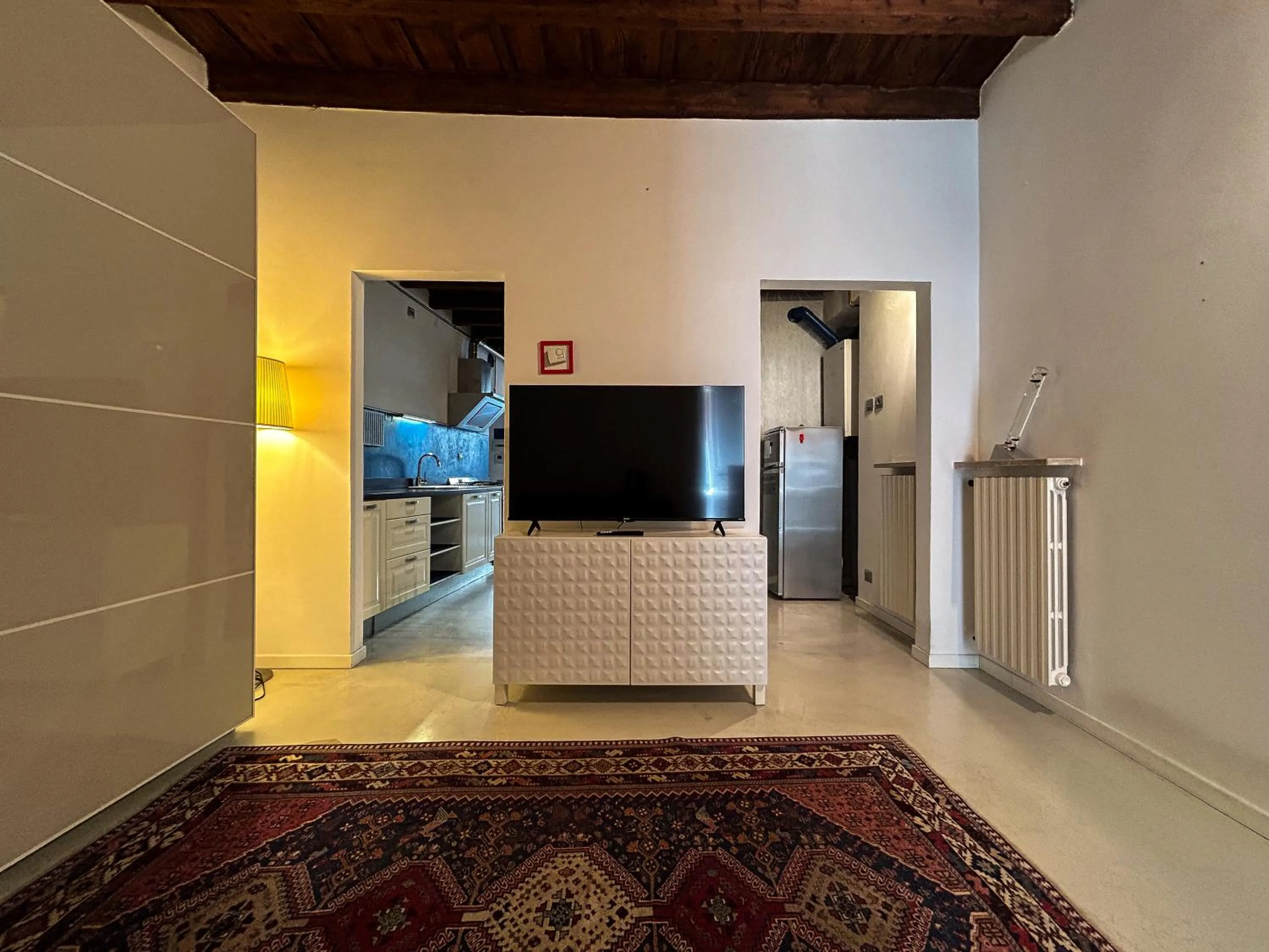 Communal lounge/ TV room in Dimora Storica nel Cuore di Bergamo