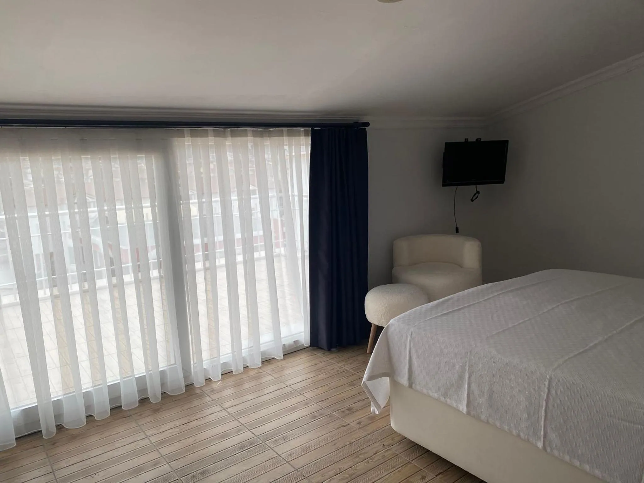 Bed in Bouvardia Inn