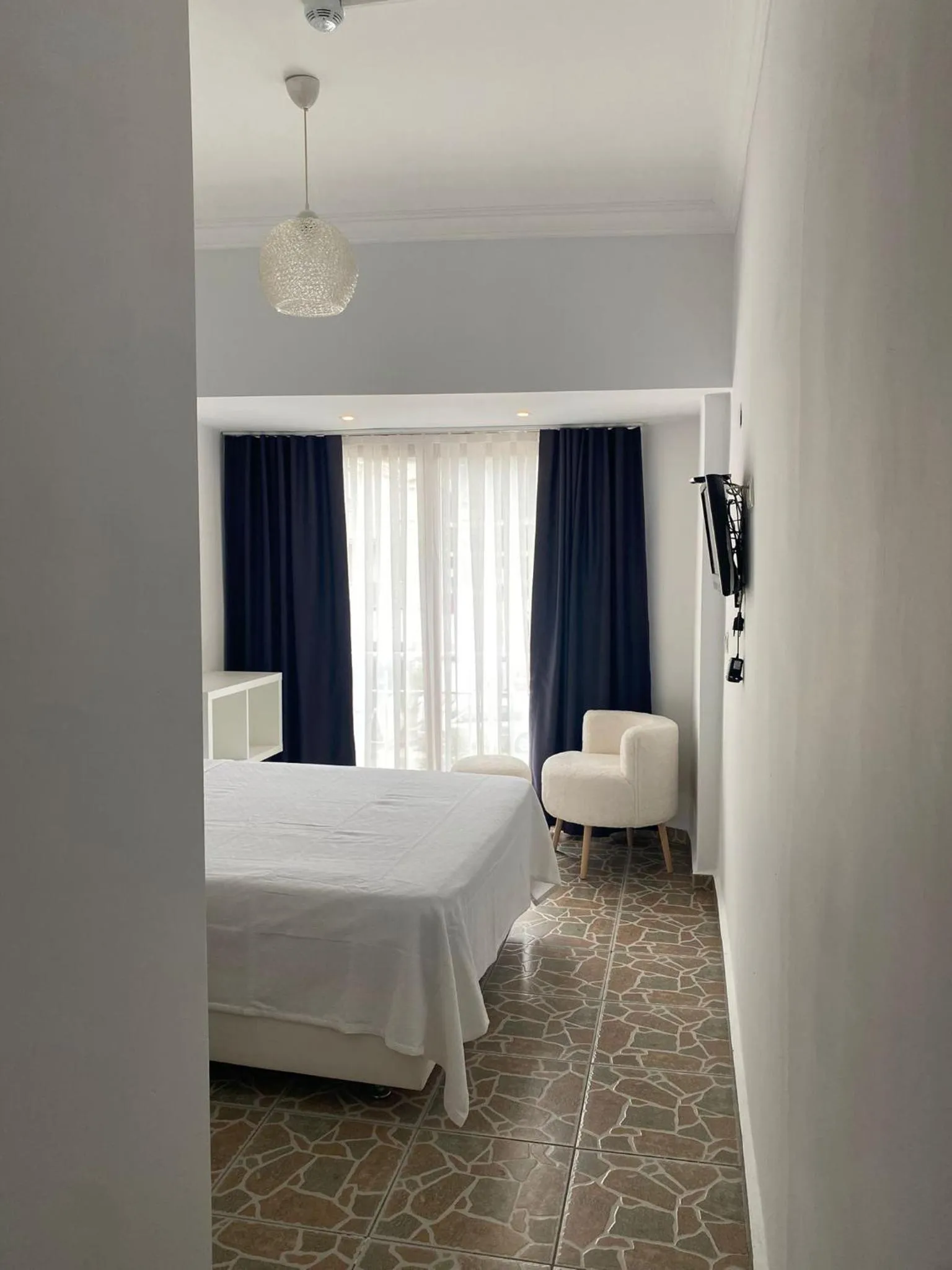 Bed in Bouvardia Inn