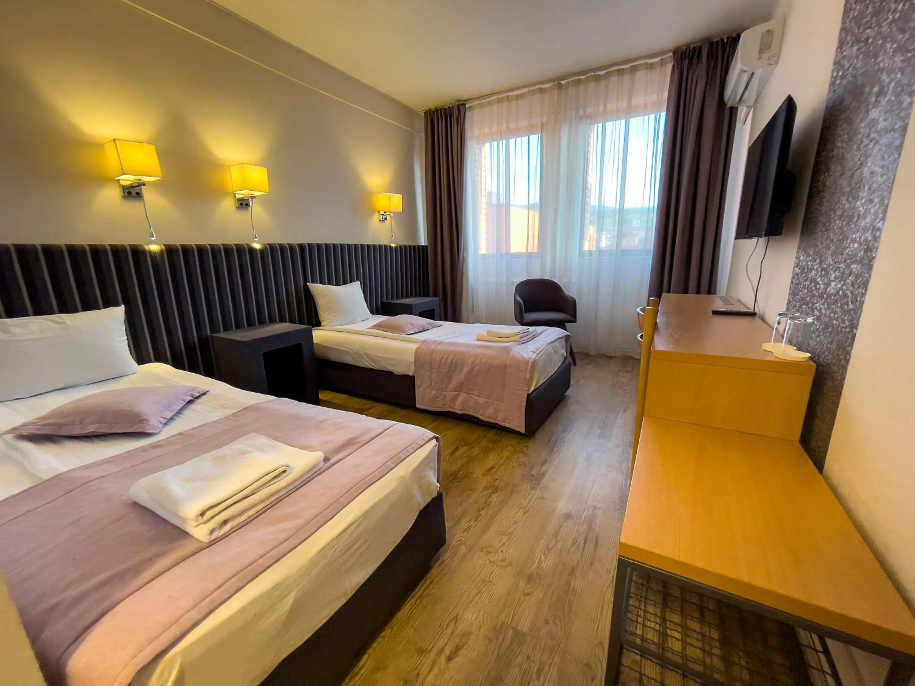 Bed in Zepter Hotel Drina Bajina Basta, member of Zepter Hotels