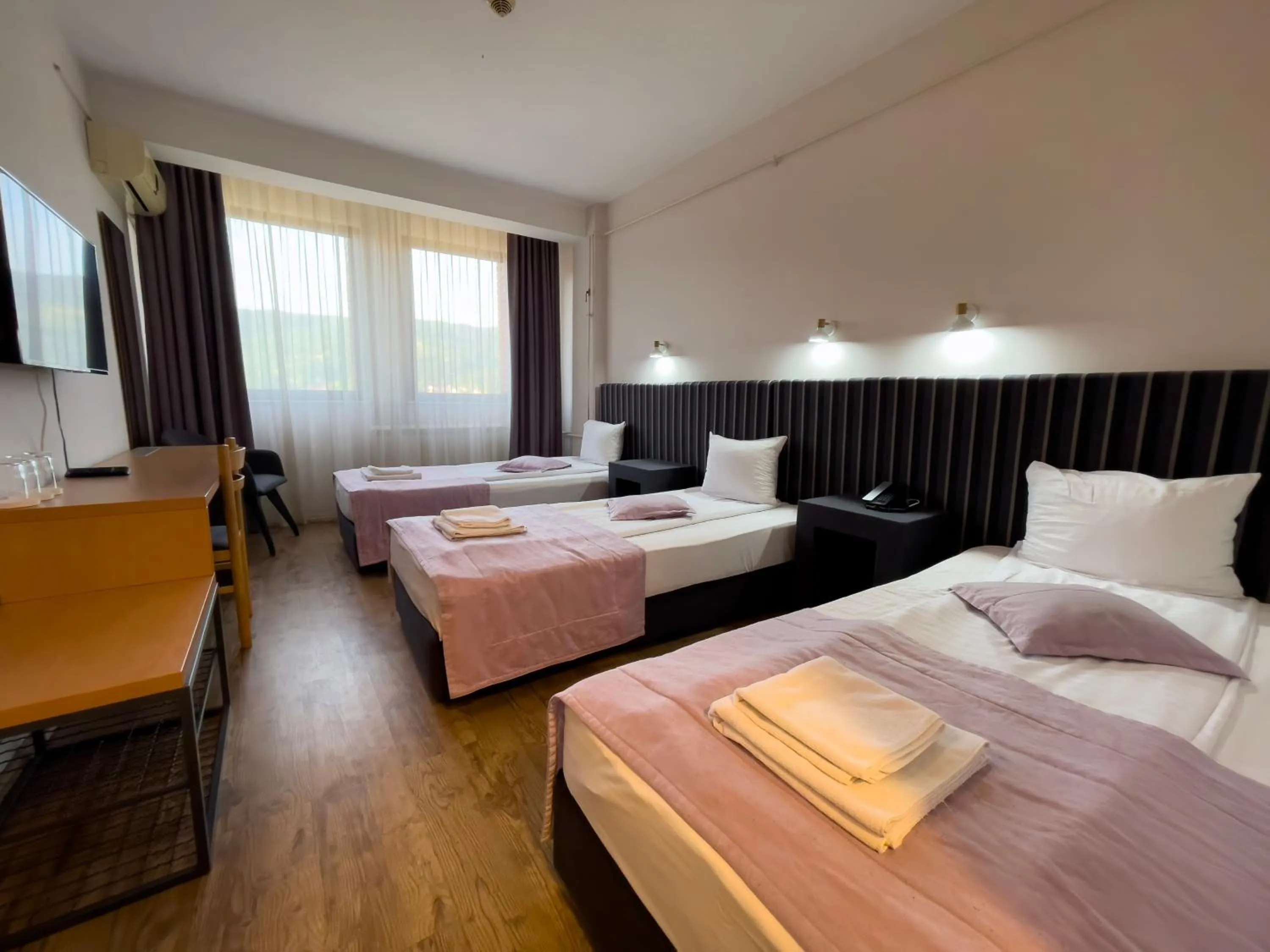 Bed in Zepter Hotel Drina Bajina Basta, member of Zepter Hotels
