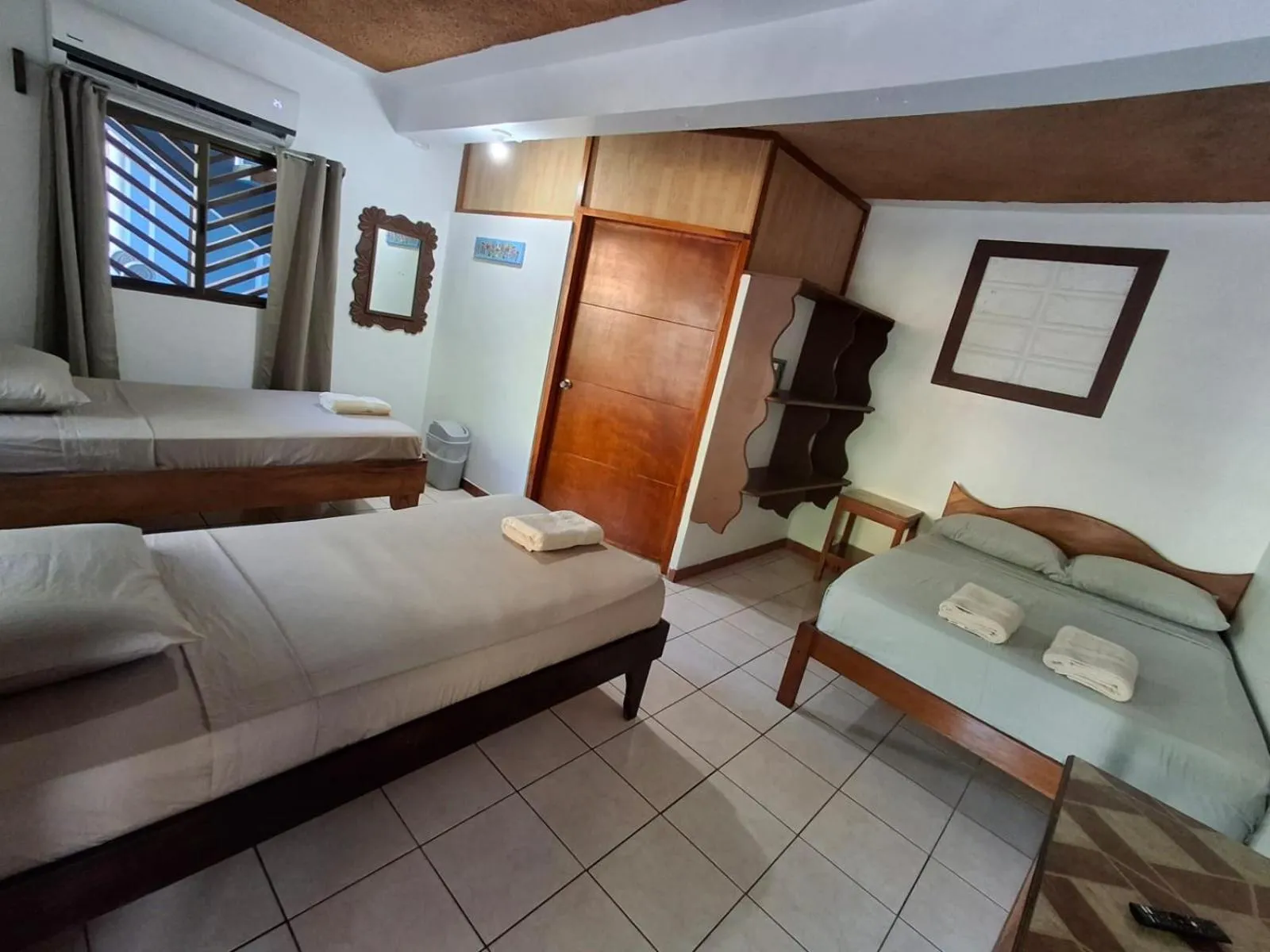Bed in Hotel Marielos Tamarindo