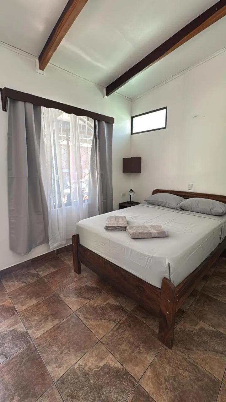 Bed in Hotel Marielos Tamarindo