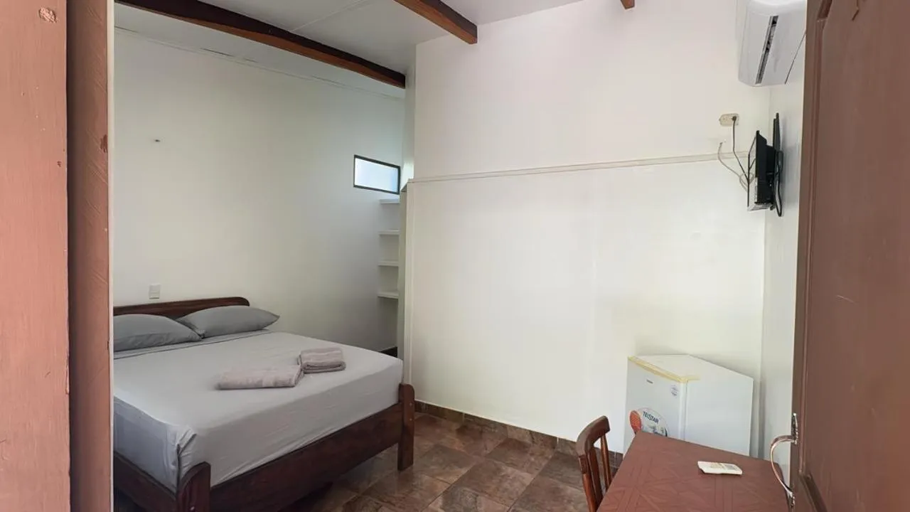 Bed in Hotel Marielos Tamarindo