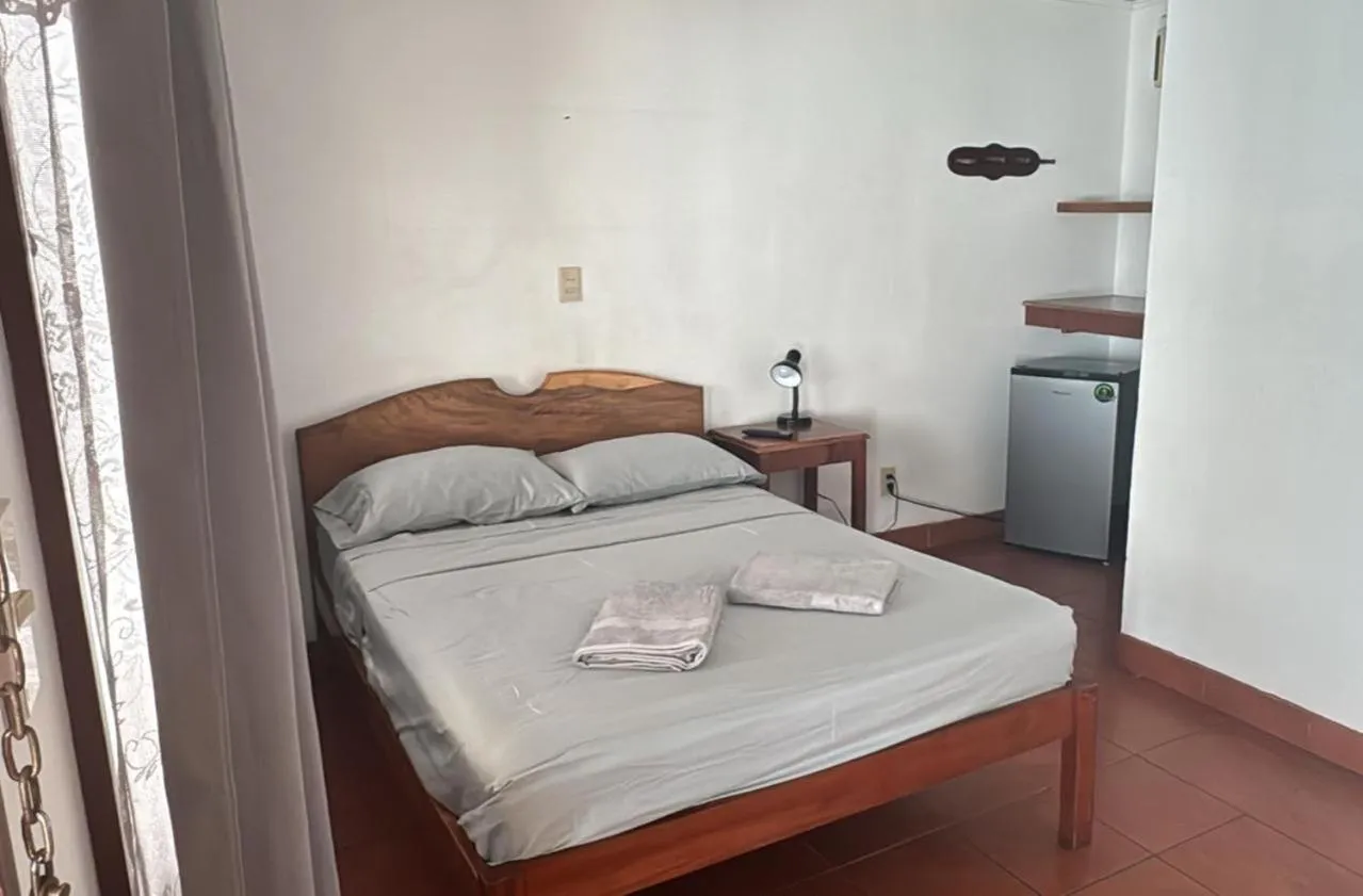 Bed in Hotel Marielos Tamarindo