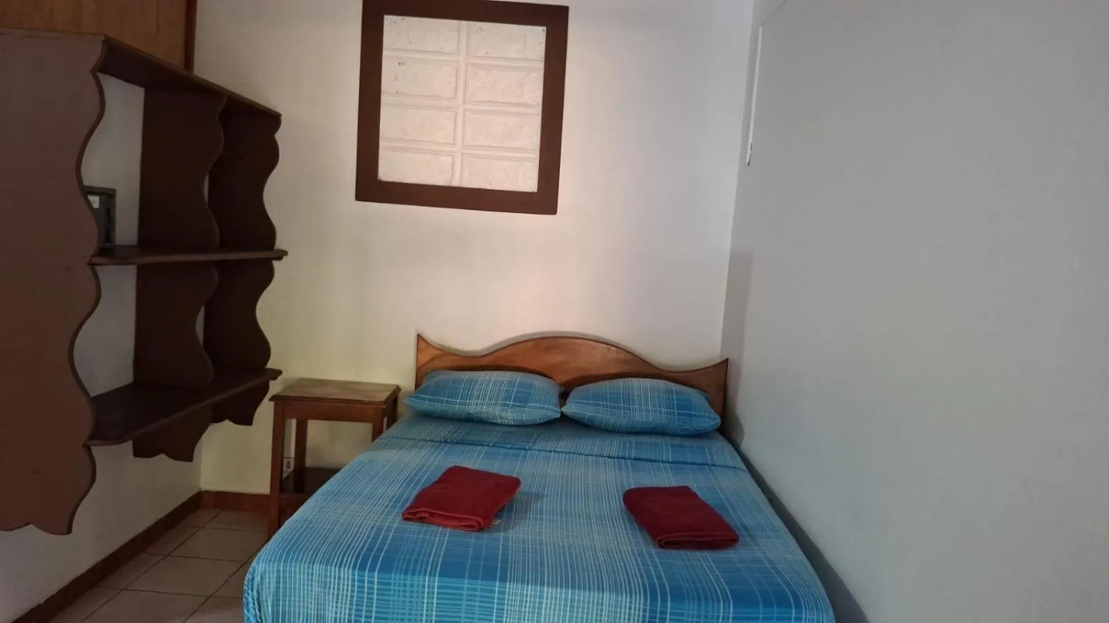 Bed in Hotel Marielos Tamarindo