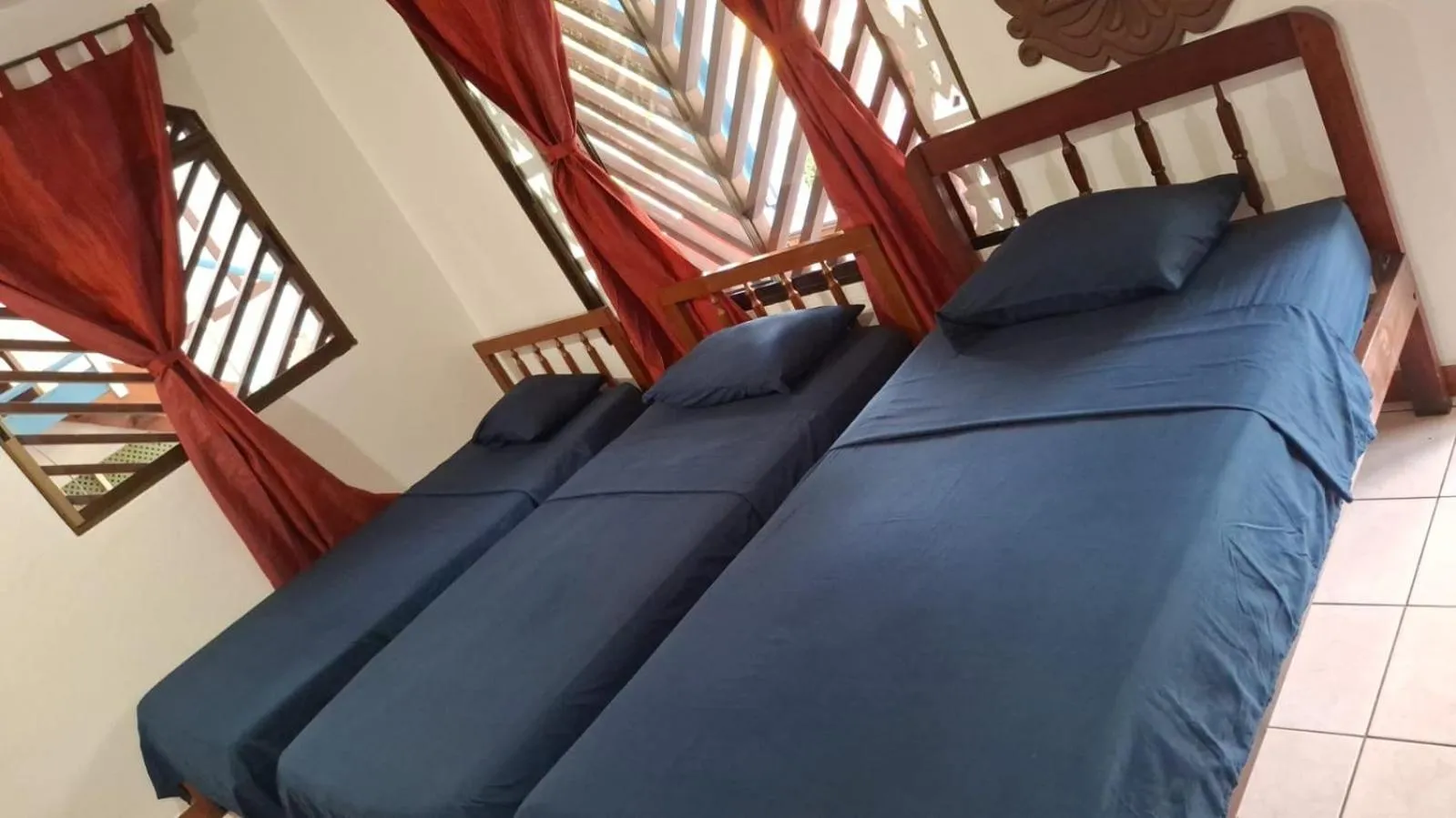 Bed in Hotel Marielos Tamarindo