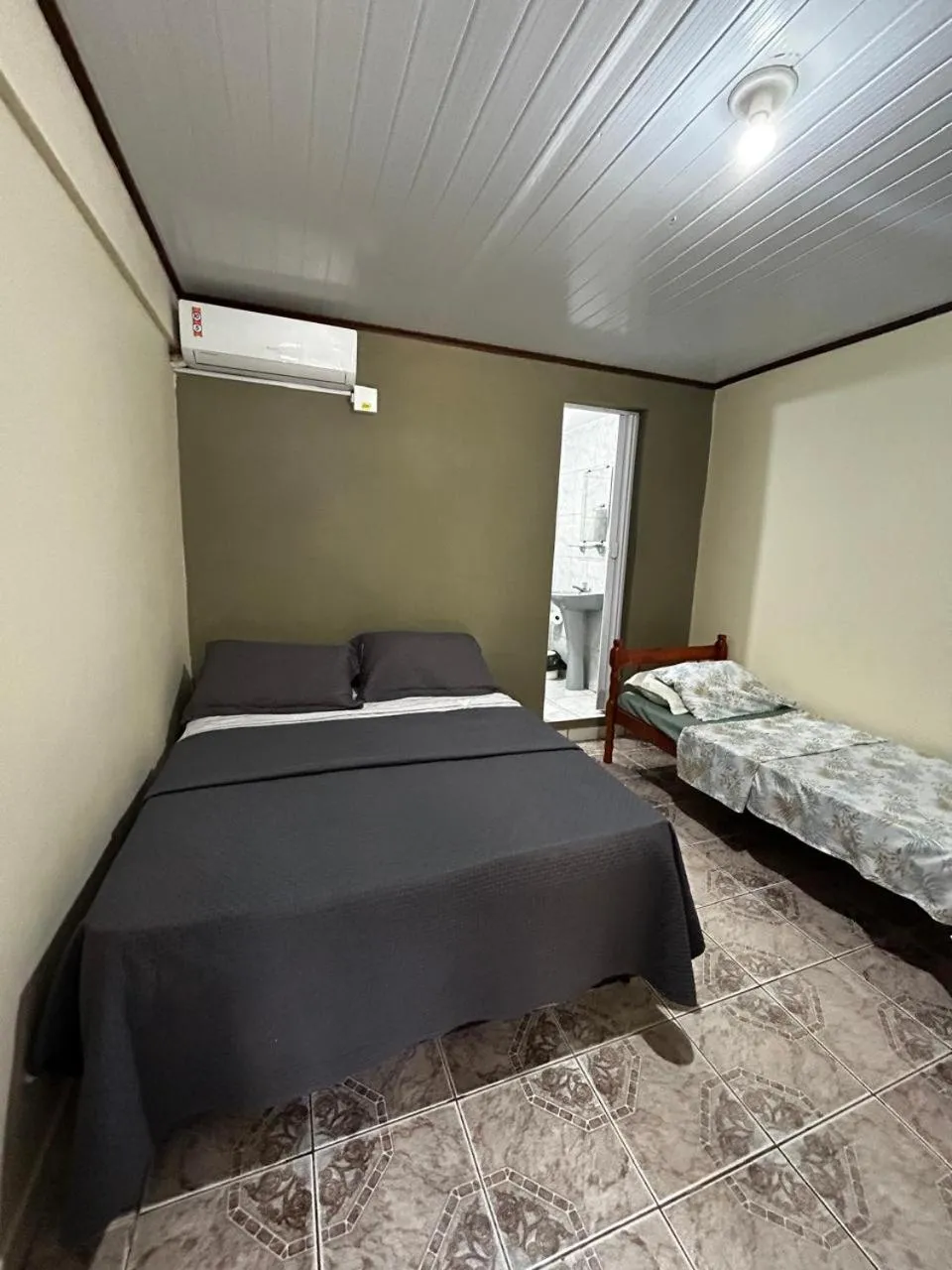 Bed in Pousada Toca da Ilha